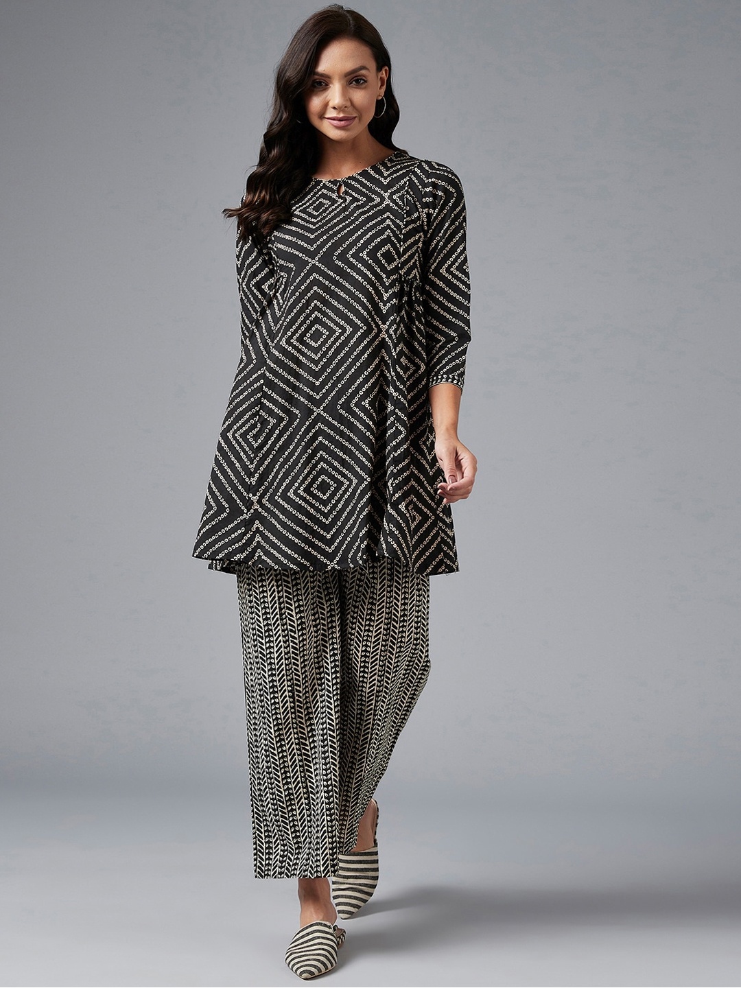 

Azira Women Black Printed Angrakha Pure Cotton Kurti with Palazzos