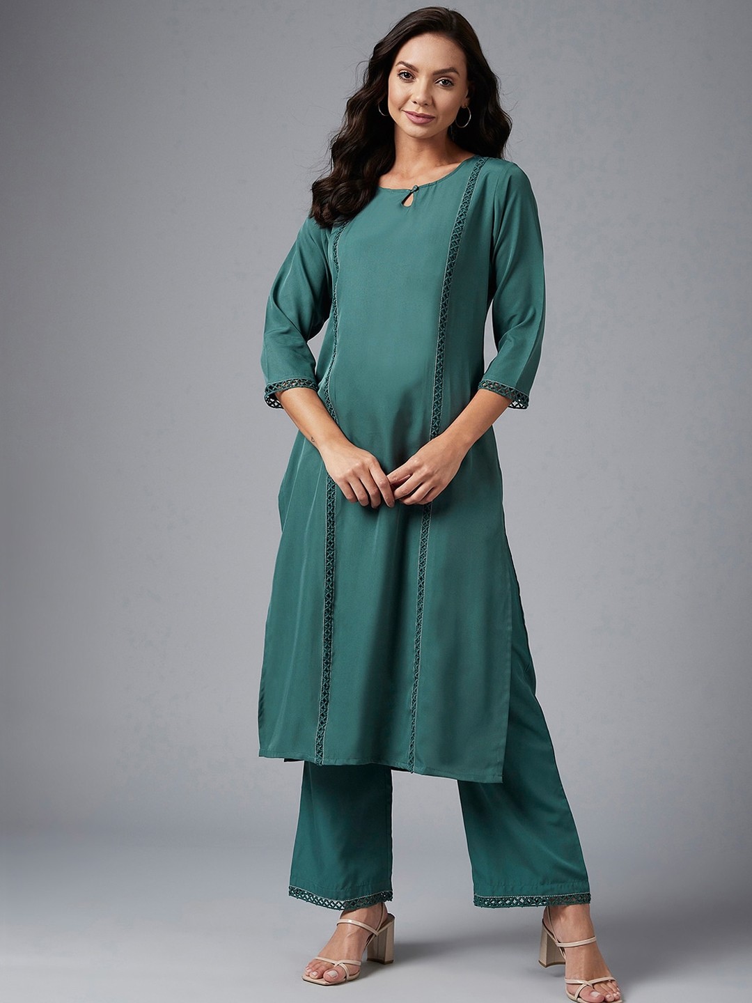 

Azira Women Green Kurta with Palazzos