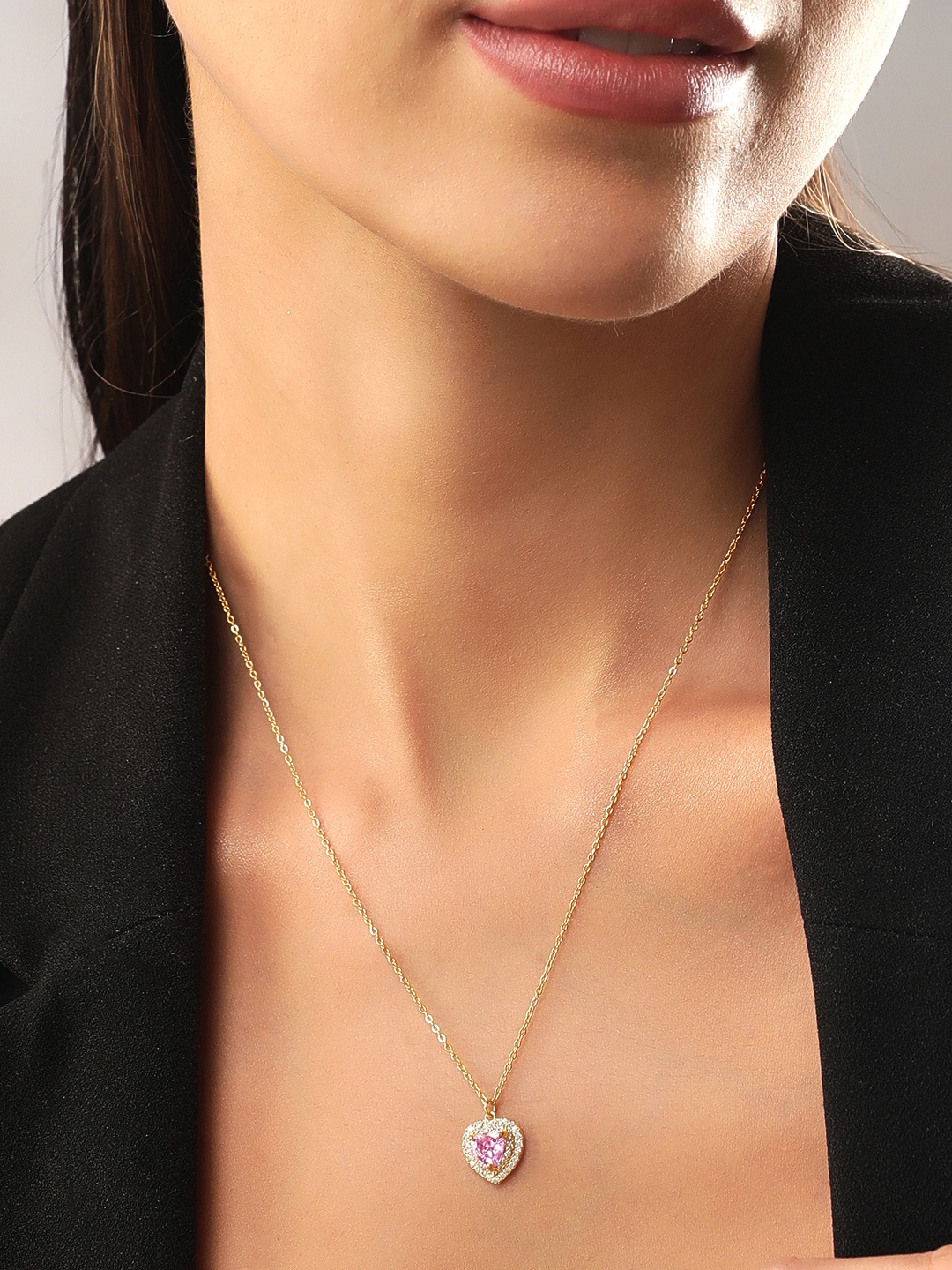 

Rubans Voguish 22K Gold-Plated White & Pink AD Studded Heart Shaped Pendant Necklace