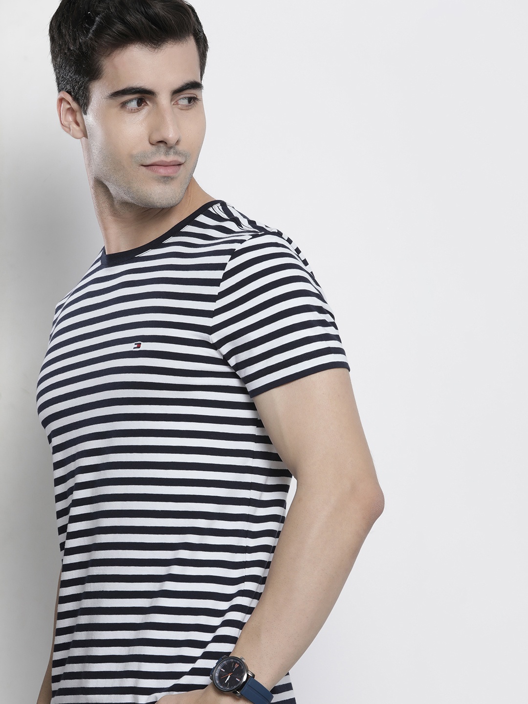 

Tommy Hilfiger Men Navy Blue & White Striped Slim Fit Casual T-shirt