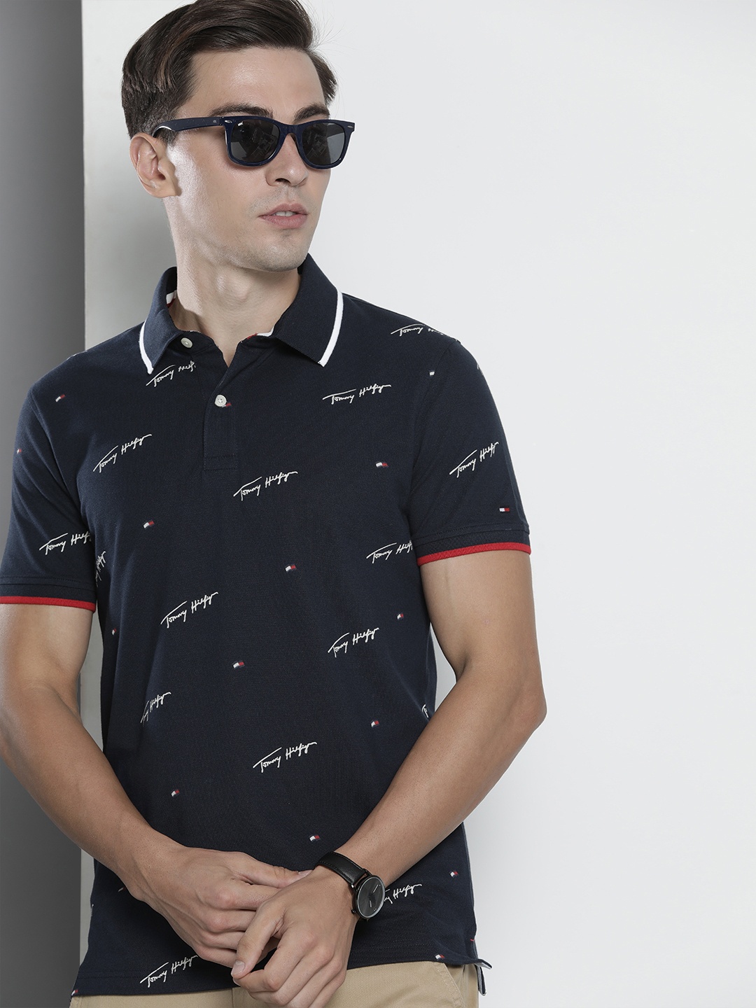 

Tommy Hilfiger Men Navy Blue Brand Logo Printed Polo Collar Slim Fit T-shirt