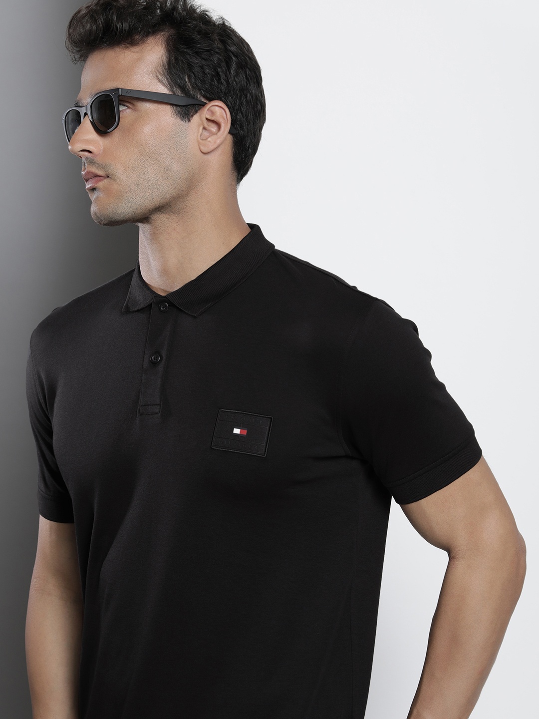 

Tommy Hilfiger Men Black Pure Cotton Solid Polo Collar T-shirt