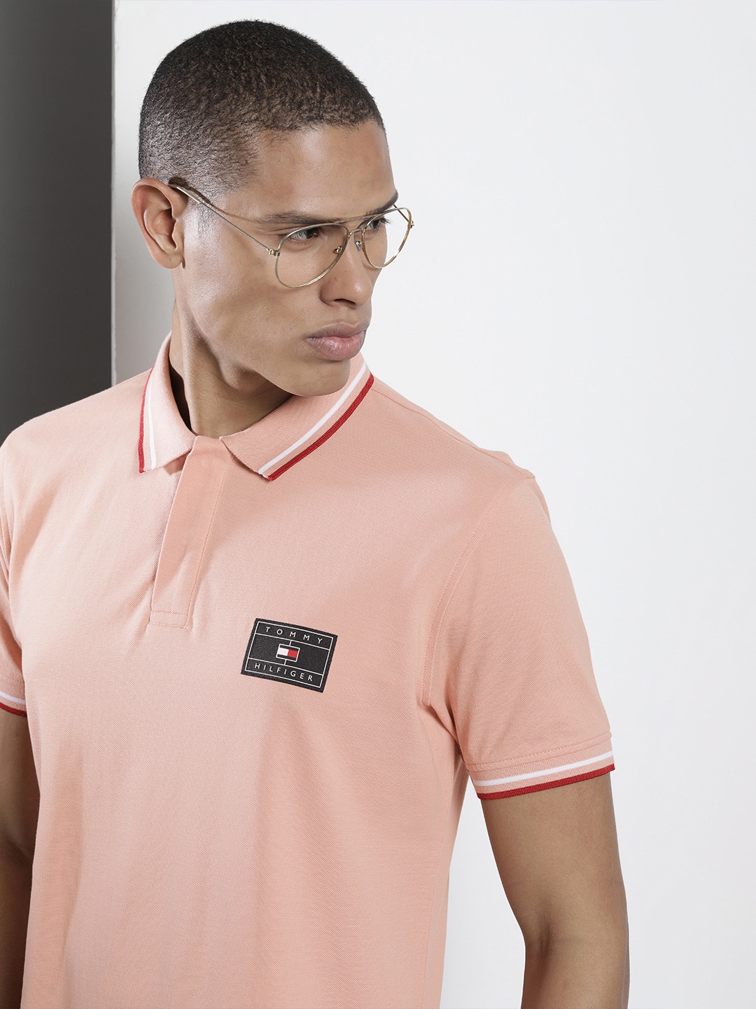 

Tommy Hilfiger Men Peach-Coloured Pure Cotton Solid Polo Collar T-shirt