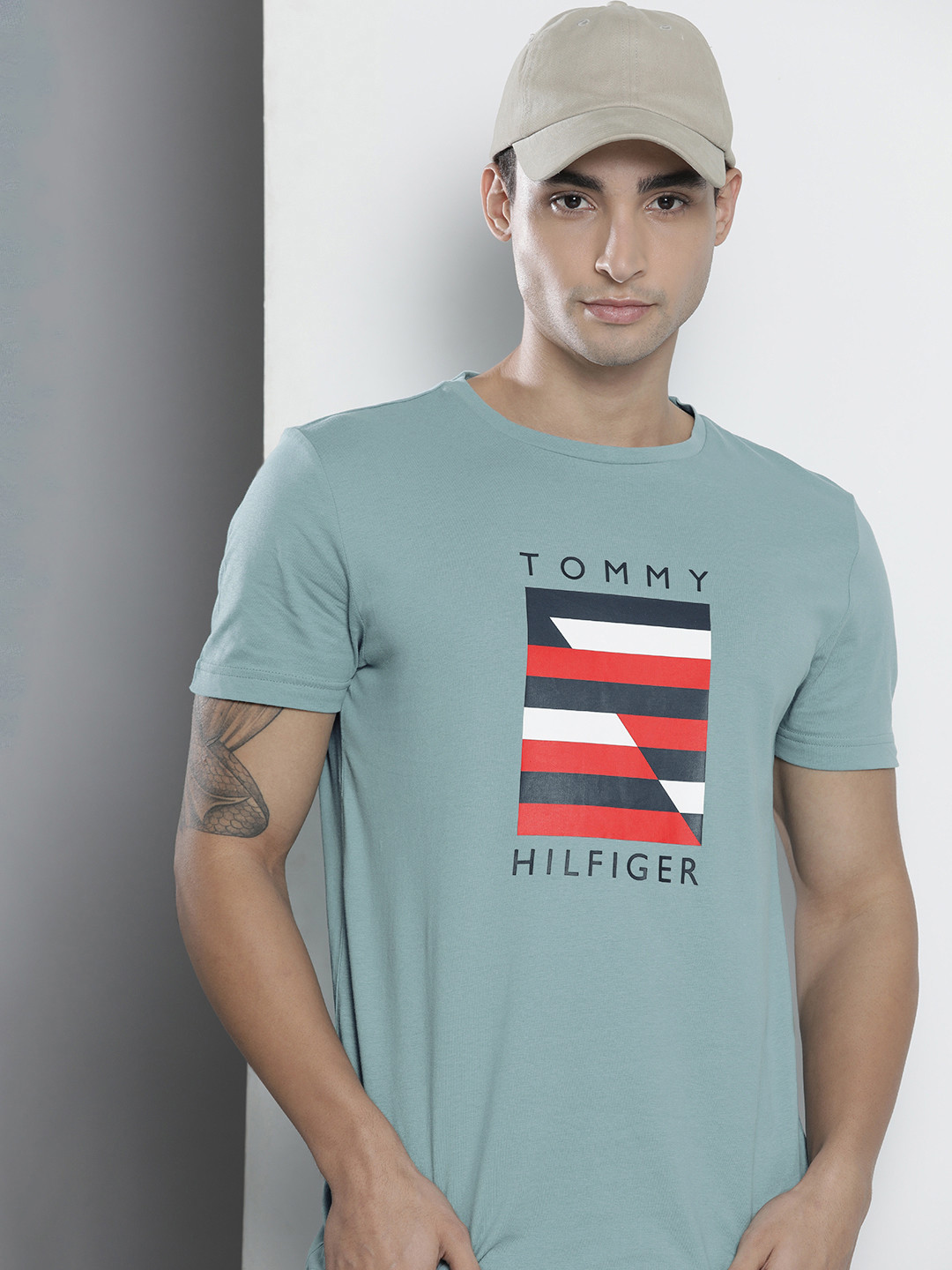 

Tommy Hilfiger Men Blue & Red Brand Logo Printed Pure Cotton T-shirt