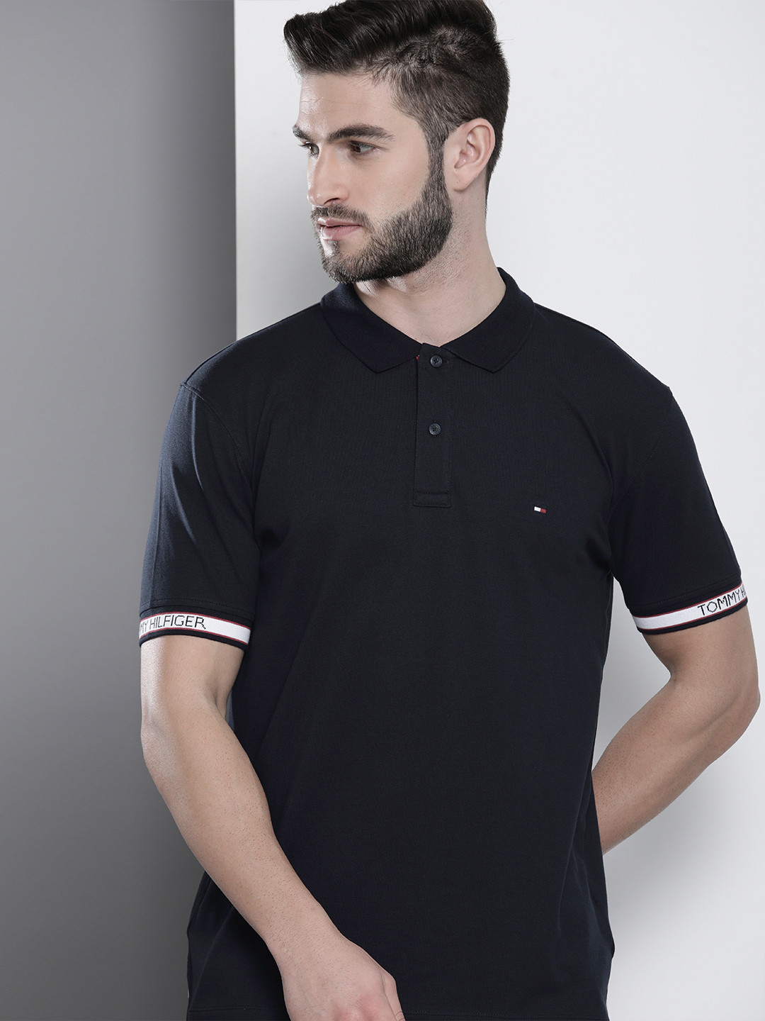 

Tommy Hilfiger Men Navy Blue Brand Logo Printed Polo Collar T-shirt