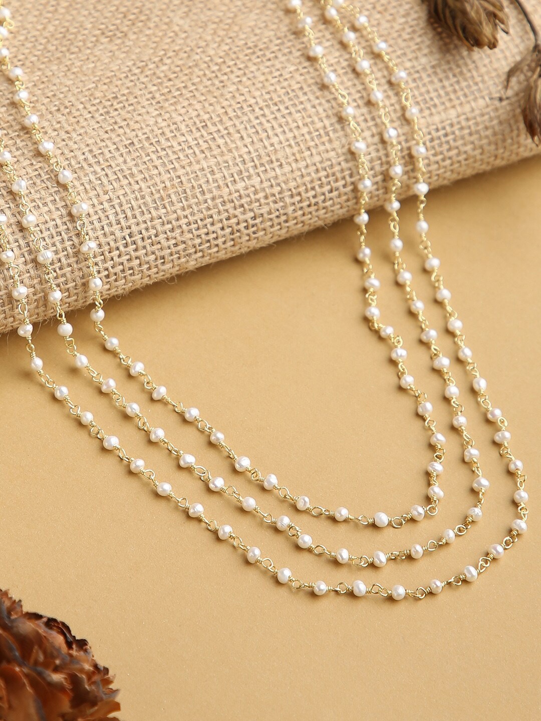 

justpeachy Women Gold-Toned & Plated Beaded Layered Necklace