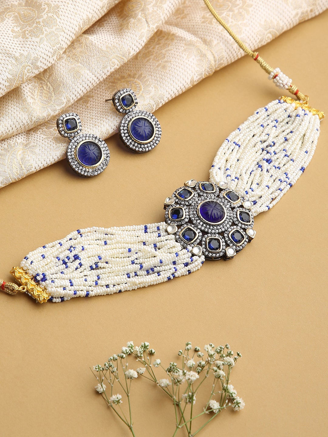 

justpeachy Women Blue & White Stone-Studded & Beaded Choker Jewellery Set