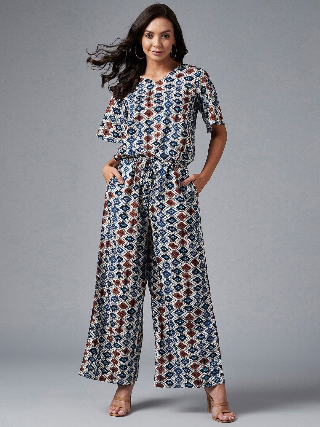 

Azira White & Blue Printed Basic Jumpsuit