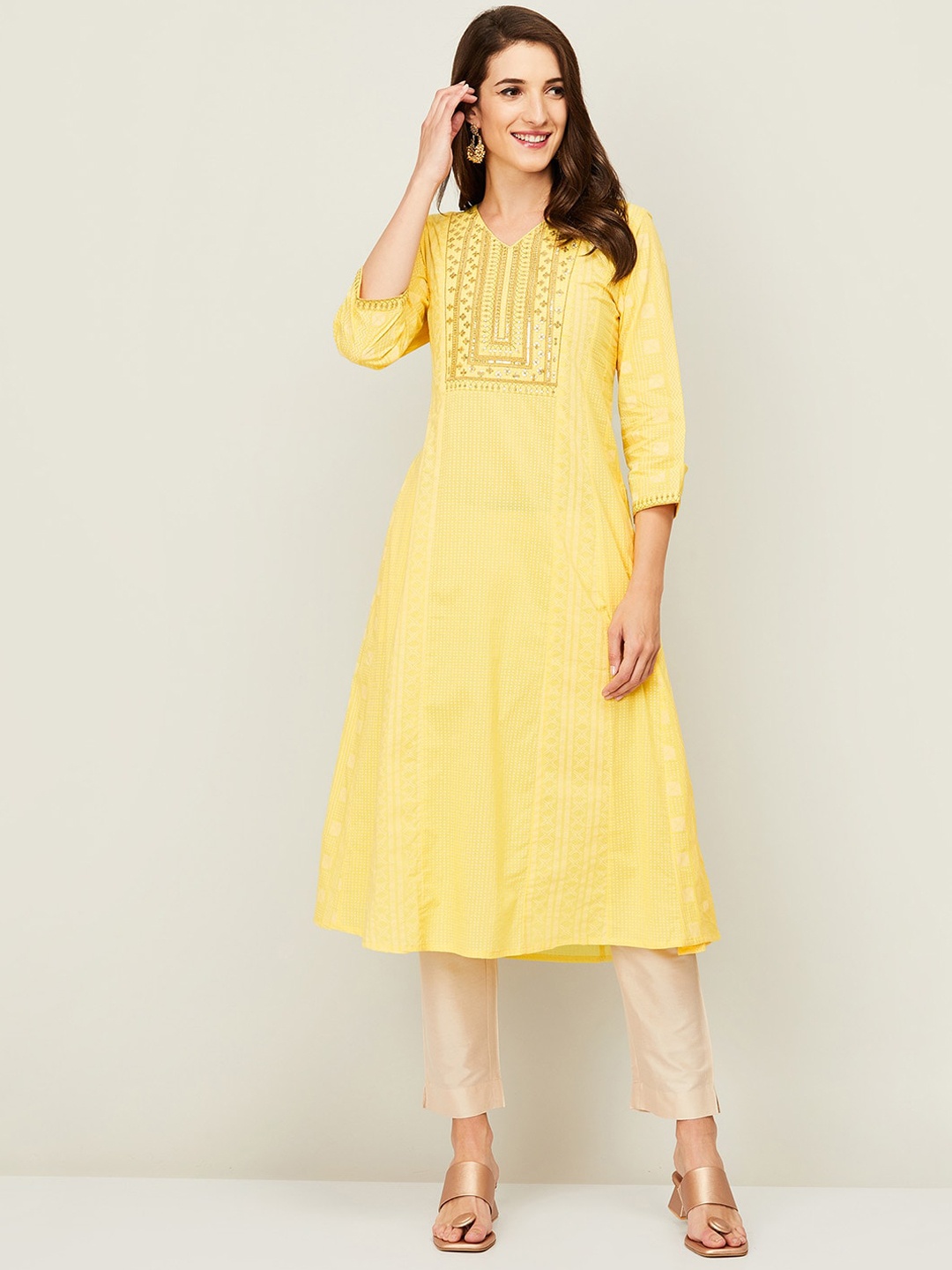 

Melange by Lifestyle Women Yellow Sequined Embellished A-Line Cotton Kurta