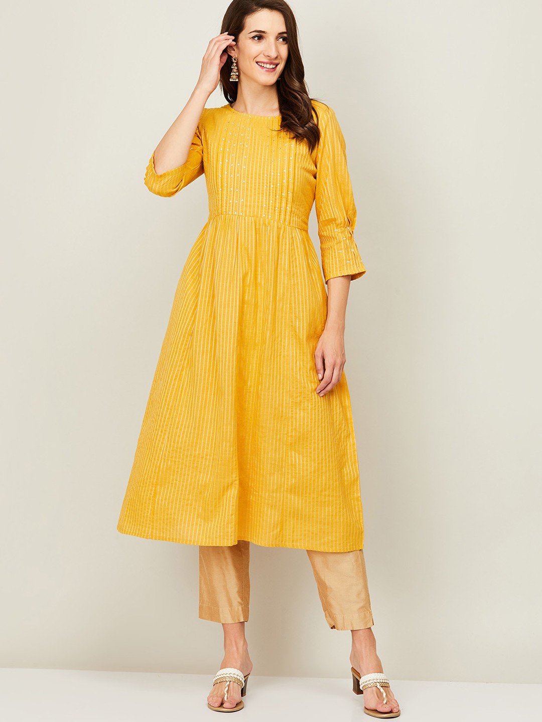 

Melange by Lifestyle Women Yellow Ethnic Motifs Striped Thread Work Pure Cotton Kurta