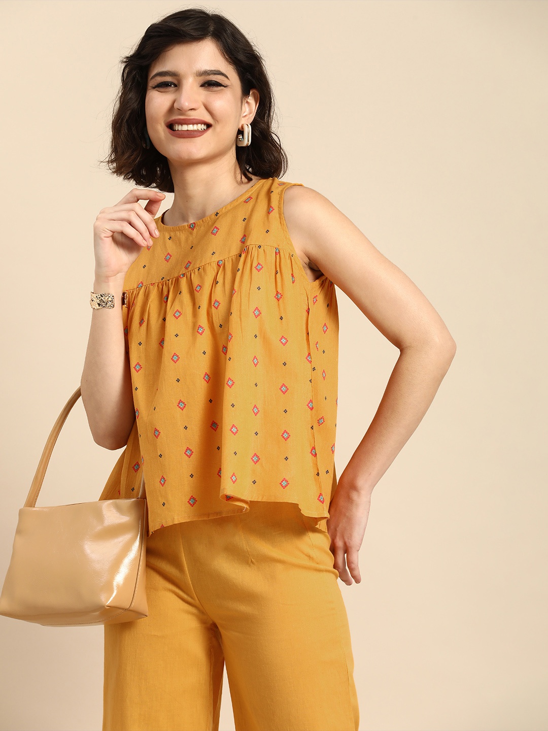 

Anouk Women Mustard Yellow Printed Empire Pure Cotton Top with Cropped Trousers