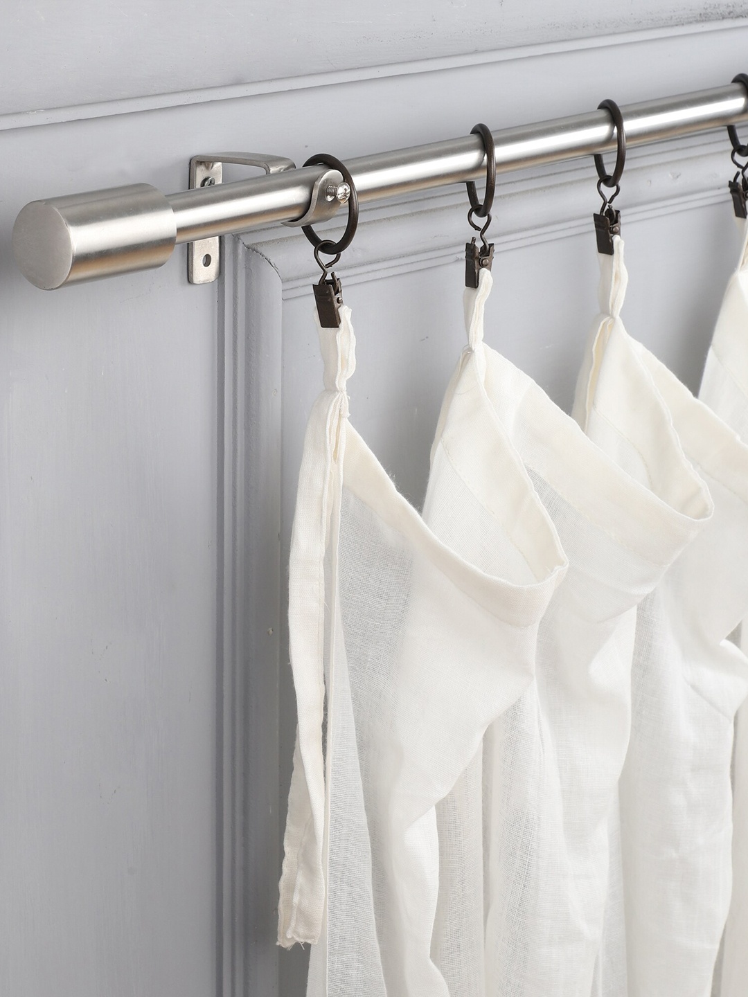

The Decor Mart Silver-Toned Stainless Steel Curtain Rods With Brackets