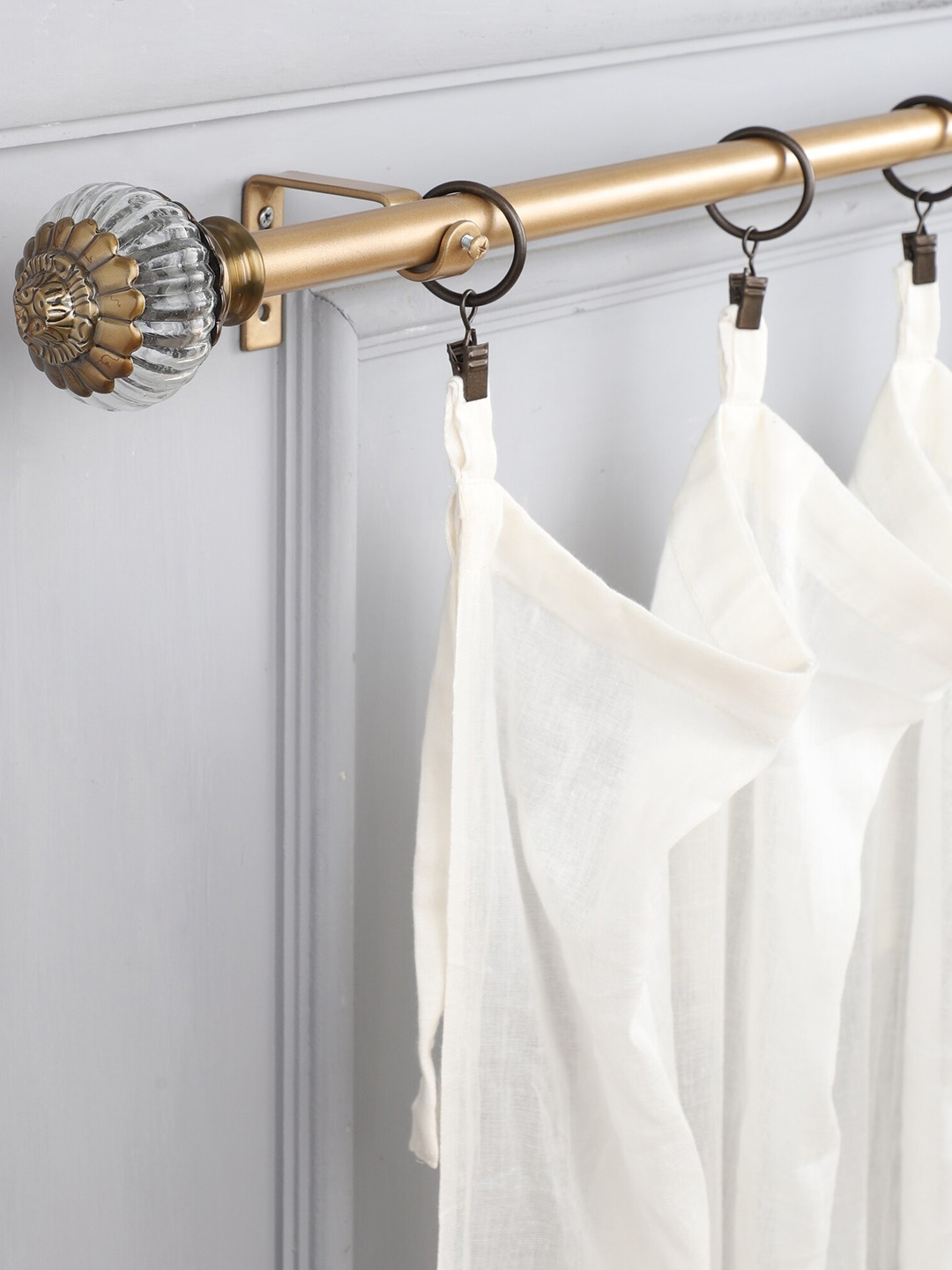 

The Decor Mart Gold-Toned & Transparent Solid Curtain Rods With Brackets