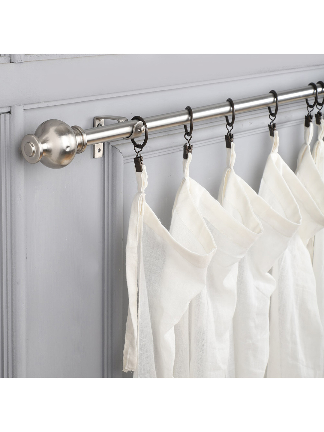 

The Decor Mart Silver-Toned Extendable Curtain Rod With Finial