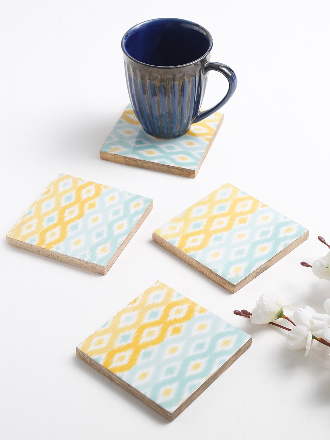 

EK BY EKTA KAPOOR Set of 4 Blue & Yellow Ikat Printed Wooden Coasters