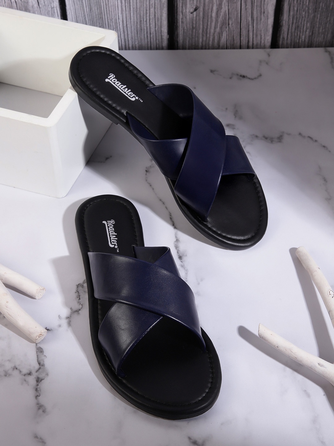 

Roadster Women Navy Blue Solid Criss-Cross Flats