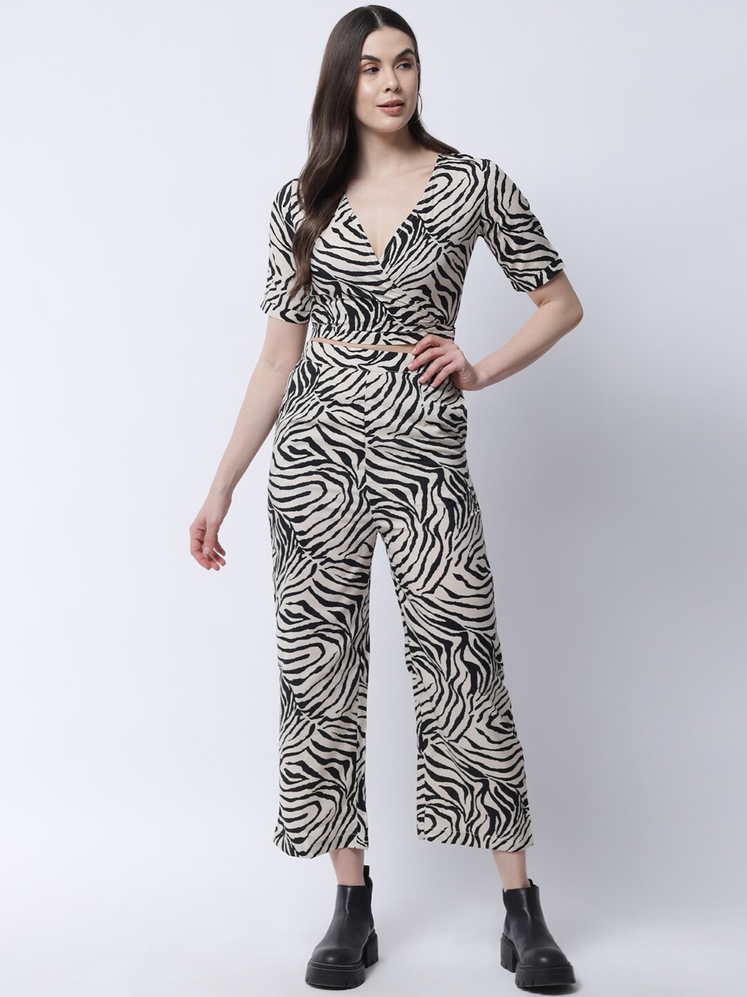 

The Vanca Women Black & Cream-Coloured Animal Printed Crop Top with Trousers