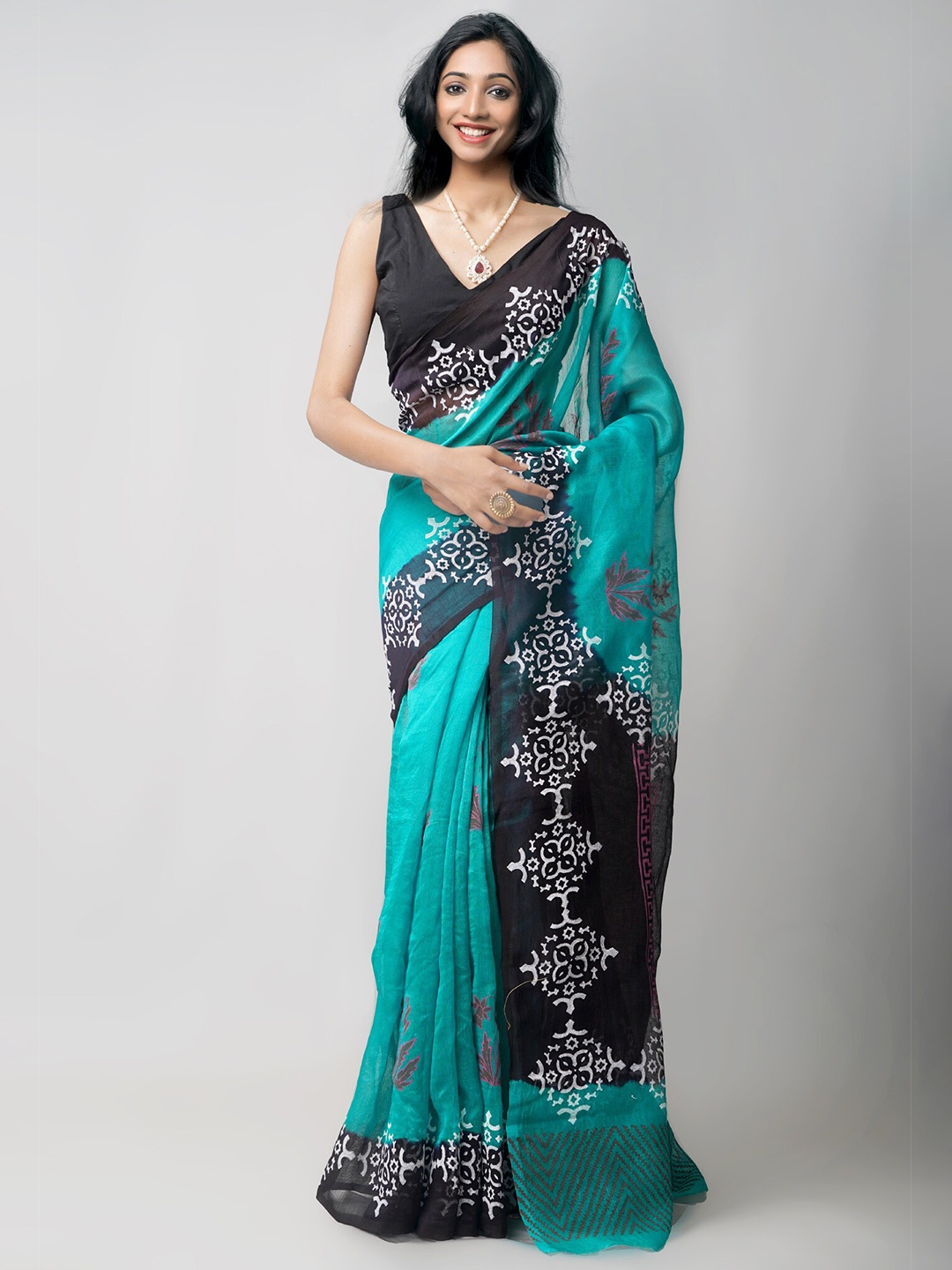 

Unnati Silks Green & Blue Ethnic Motifs Net Block Print Saree