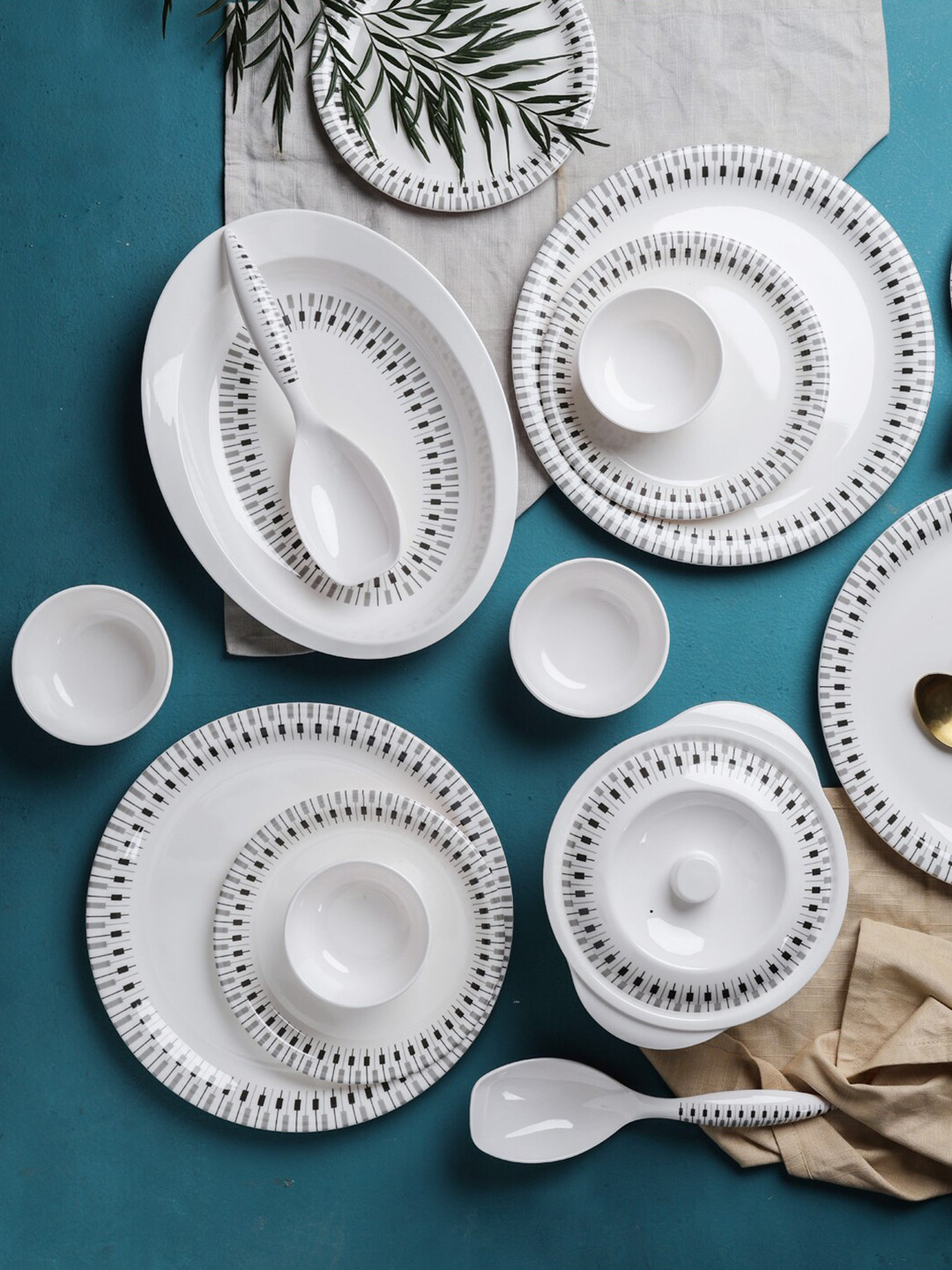 

Servewell White & Black 31 Pieces Geometric Printed Melamine Glossy Dinner Set