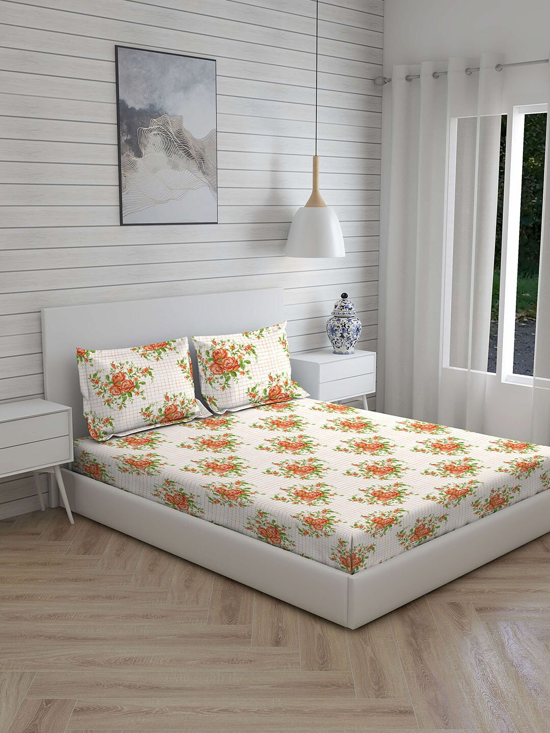 

Layers Orange & White Floral 230 TC King Bedsheet with 2 Pillow Covers
