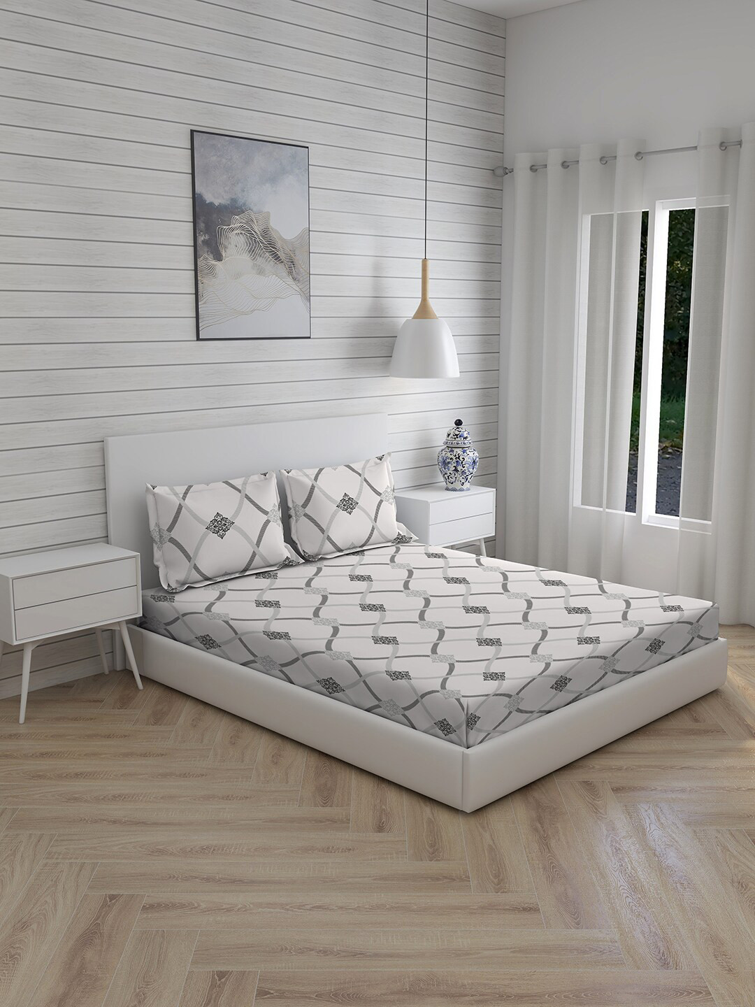 

Layers Grey & White Ethnic Motifs 144 TC King Bedsheet with 2 Pillow Covers