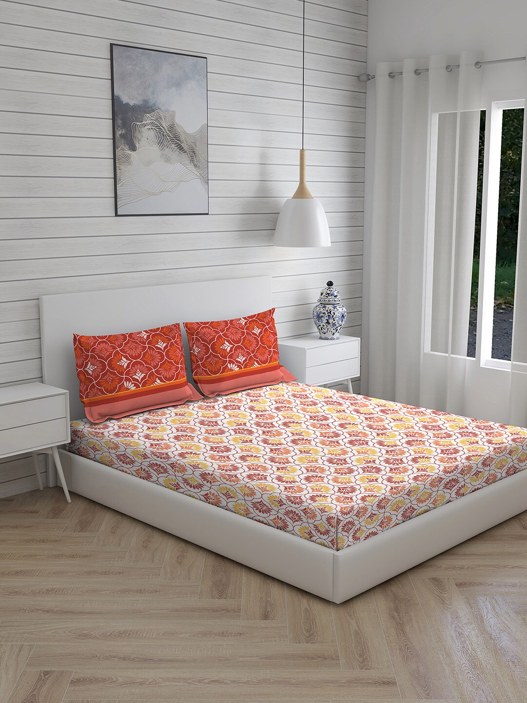 

Layers Orange & White Floral Queen Bedsheet with 2 Pillow Covers