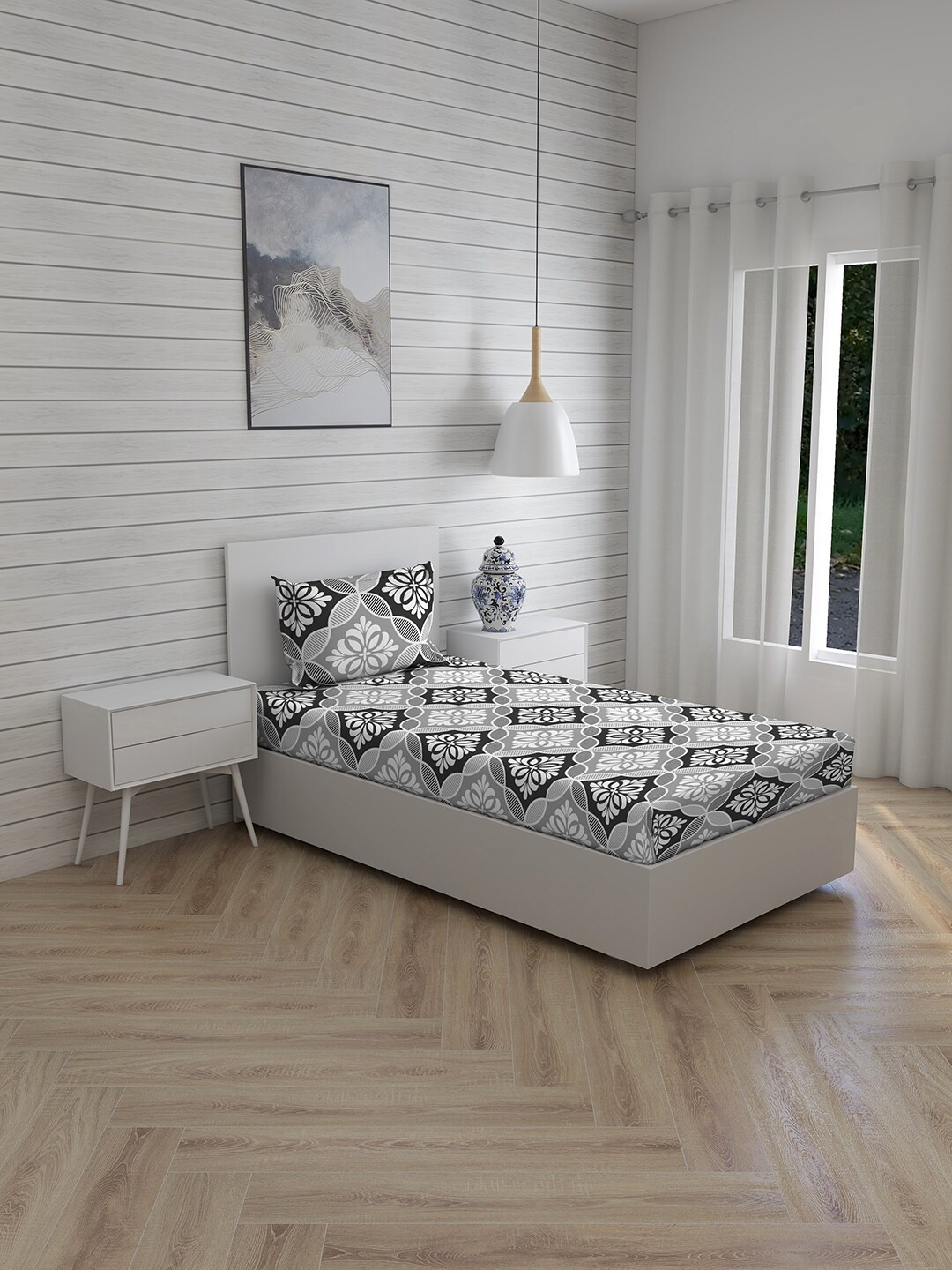 

Layers Grey & Black Ethnic Motifs 144 TC Cotton Single Bedsheet with 1 Pillow Covers