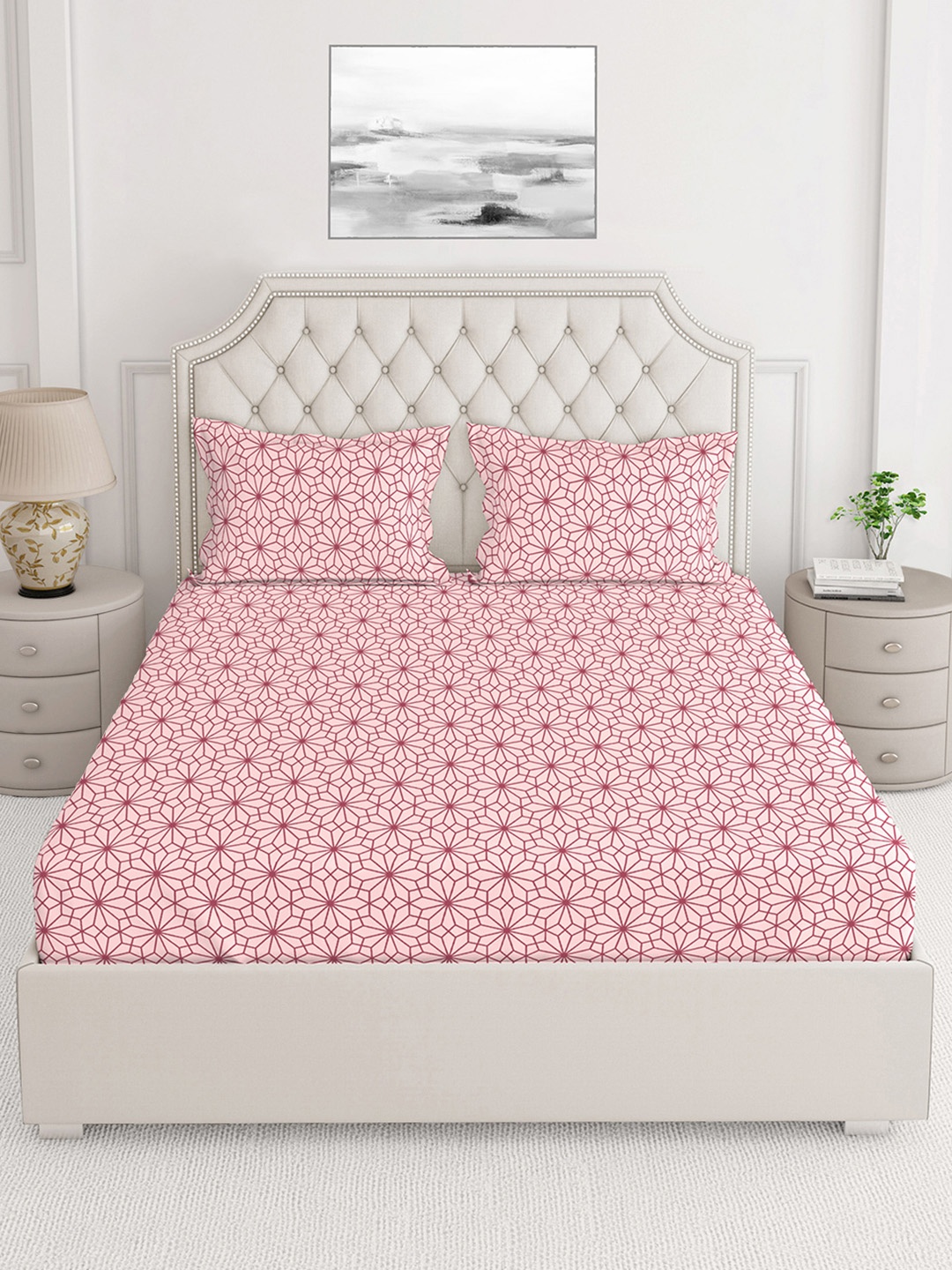 

Layers Pink & Maroon Printed 230 TC Double Bedsheet With 2 Pillow Covers