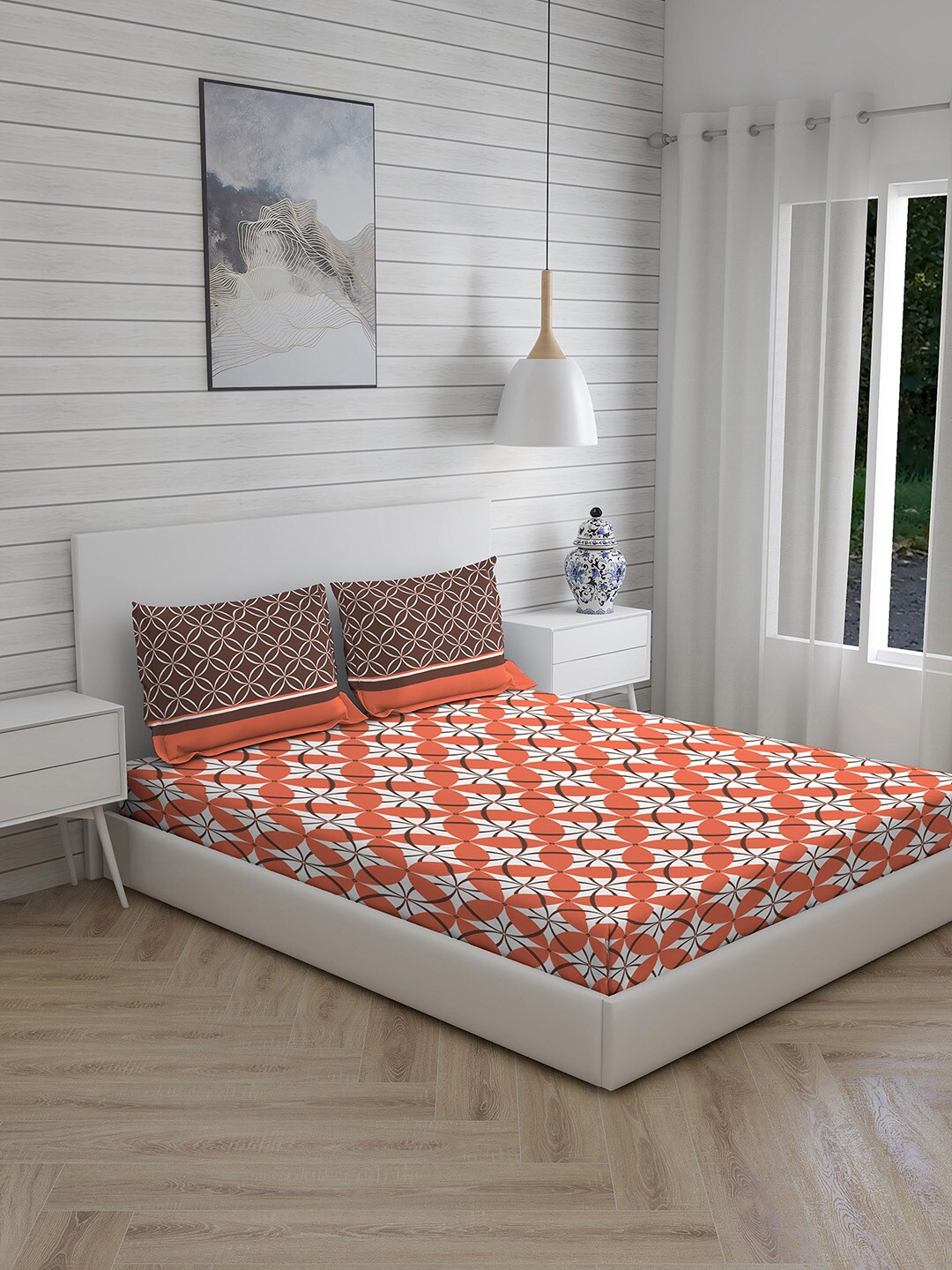 

Layers Orange & White Geometric Queen Bedsheet with 2 Pillow Covers