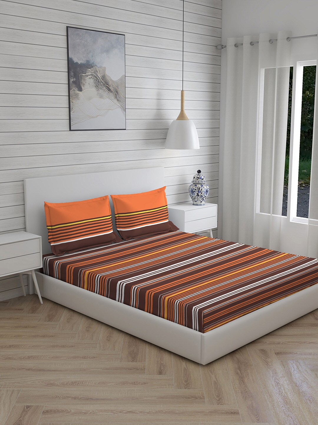 

Layers Orange Striped Queen Bedsheet with 2 Pillow Covers