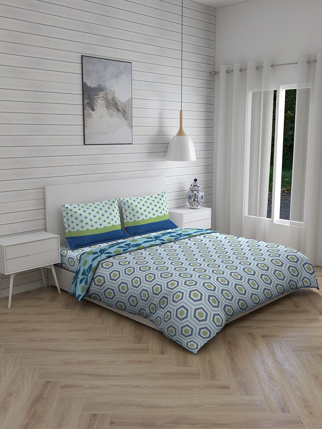 

Layers Blue Printed Double Queen Bedsheet With 2 Pillow Covers & Comforter