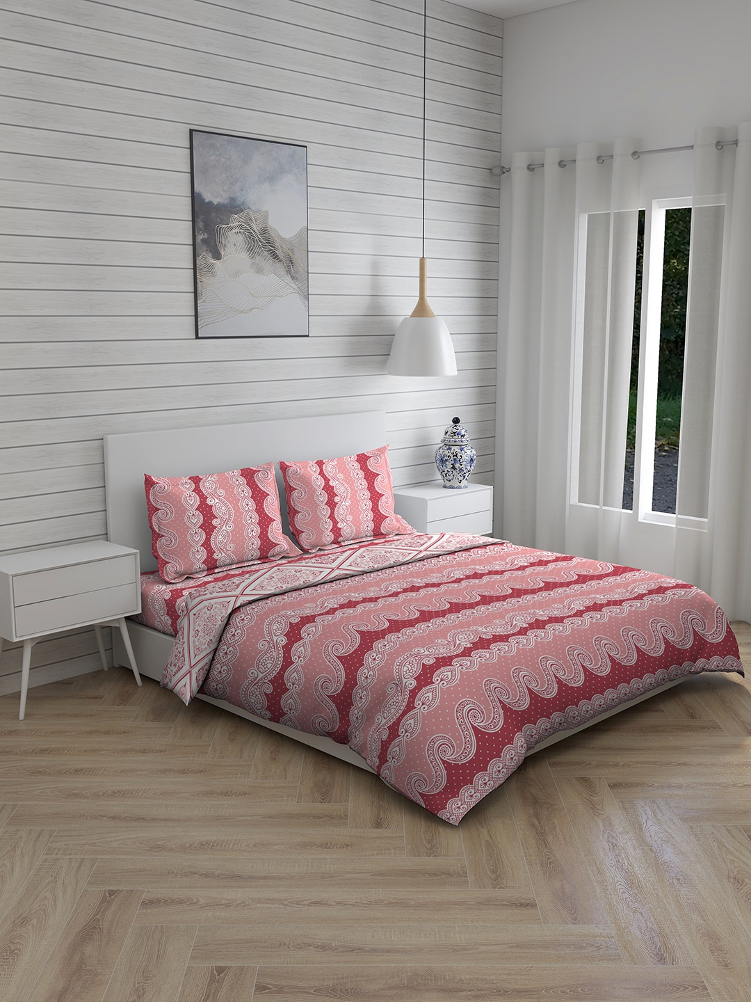 

Layers Pink & White Printed Double King Bedsheet with 2 Pillow Covers & 1 Comforter