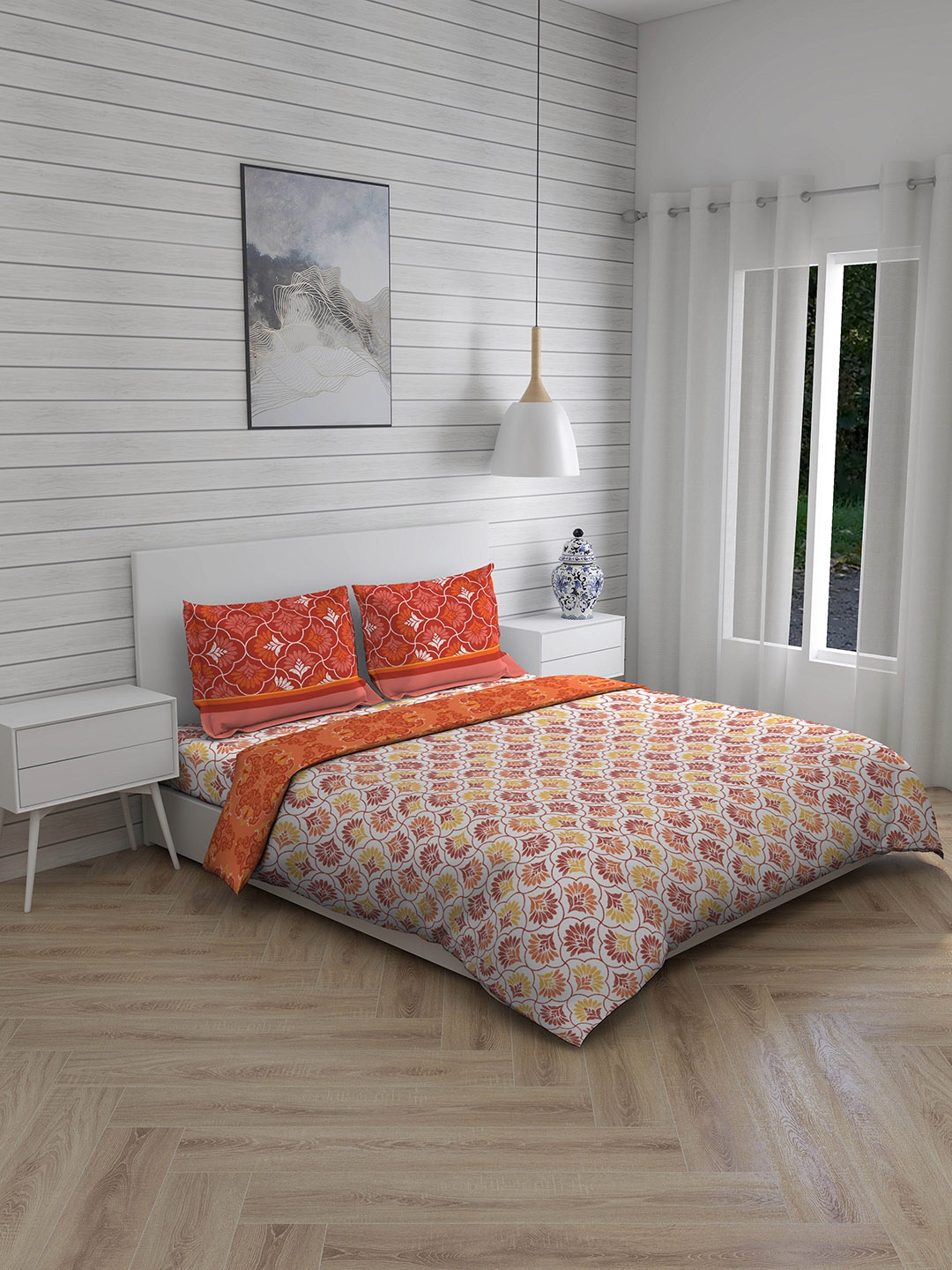 

Layers Orange & White Printed Double Queen Bedsheet with 2 Pillow Covers & 1 Comforter