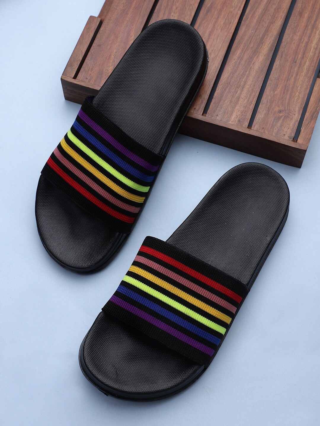 

Pampy Angel Men Black Printed Rubber Sliders