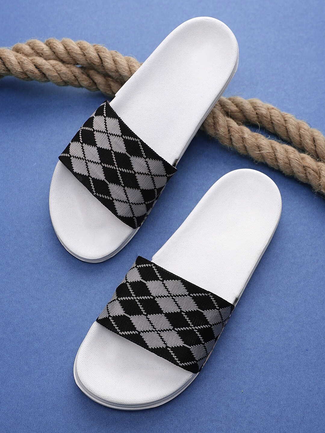 

Pampy Angel White Printed Flip Flops Sliders