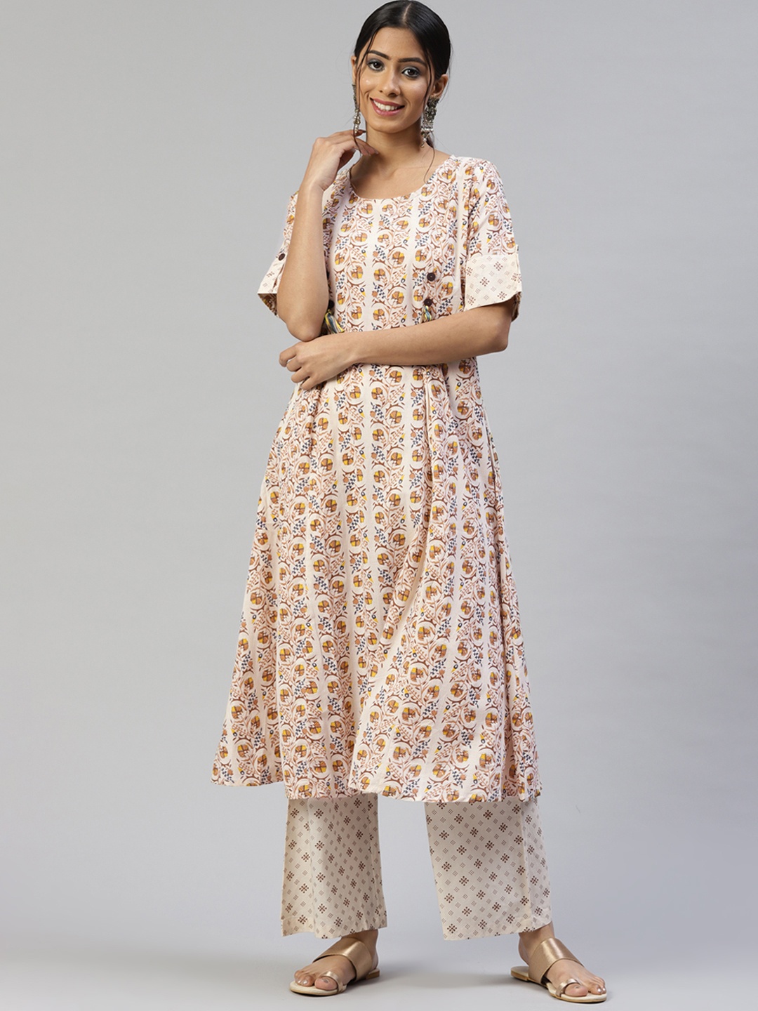 

SVARCHI Women White & Brown Pure Cotton Ethnic Motifs Printed Kurta with Palazzos