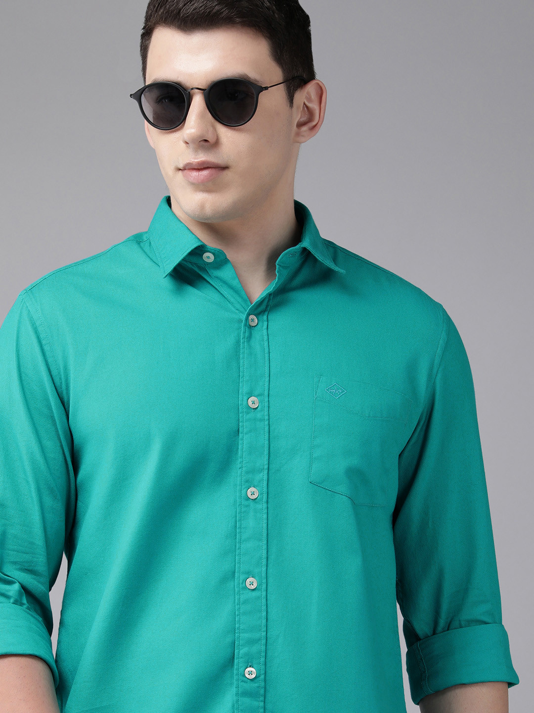 

Arrow Men Turquoise Blue Solid Original Slim Fit Casual Shirt