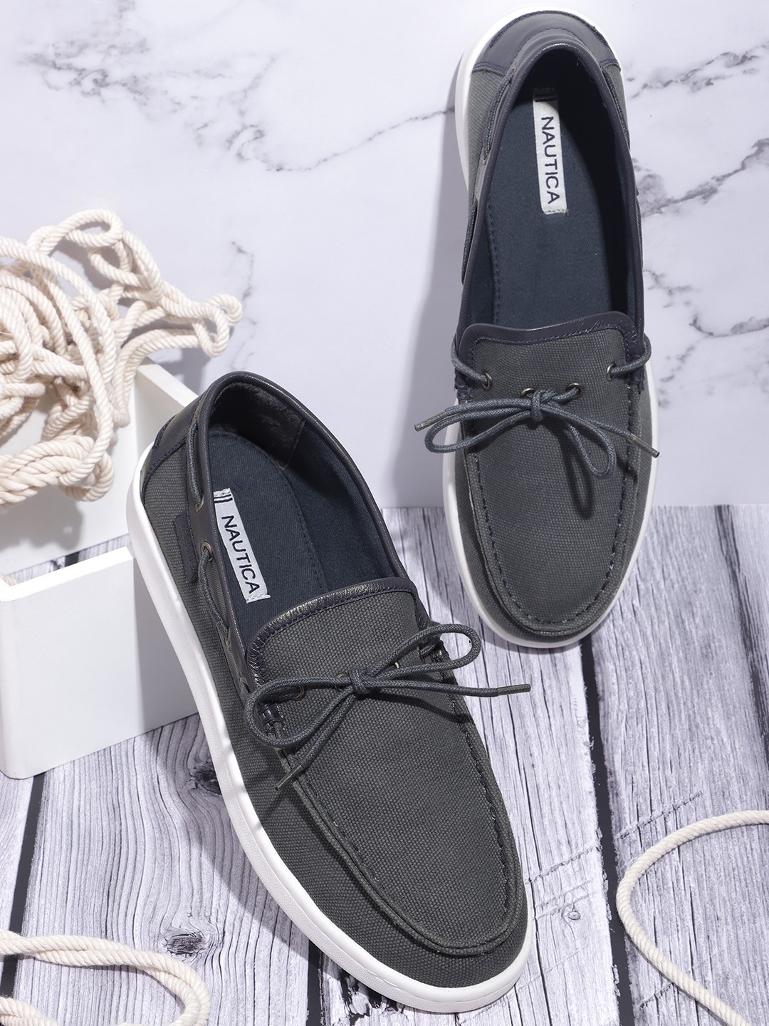 

Nautica Men Navy Blue Solid Slip-On Sneakers