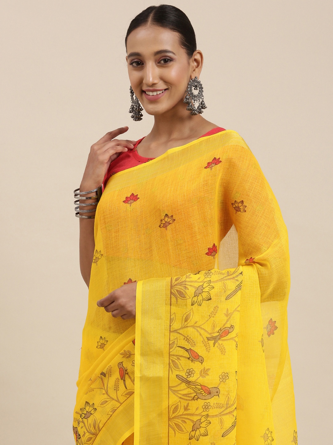 

Rudra Fashion Yellow & Red Floral Linen Blend Ikat Saree