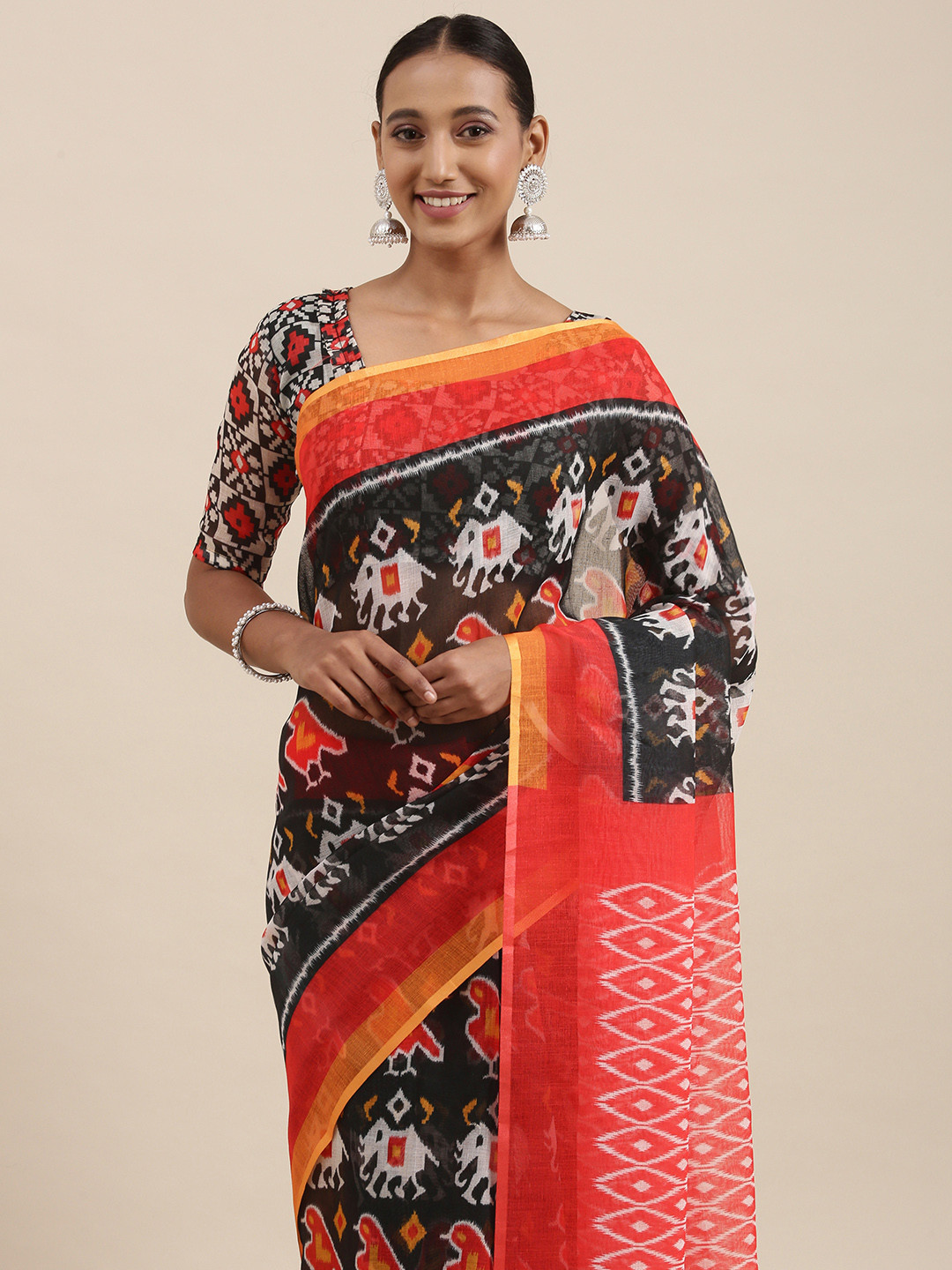 

Rudra Fashion Black & Red Ethnic Motifs Printed Ikat Saree