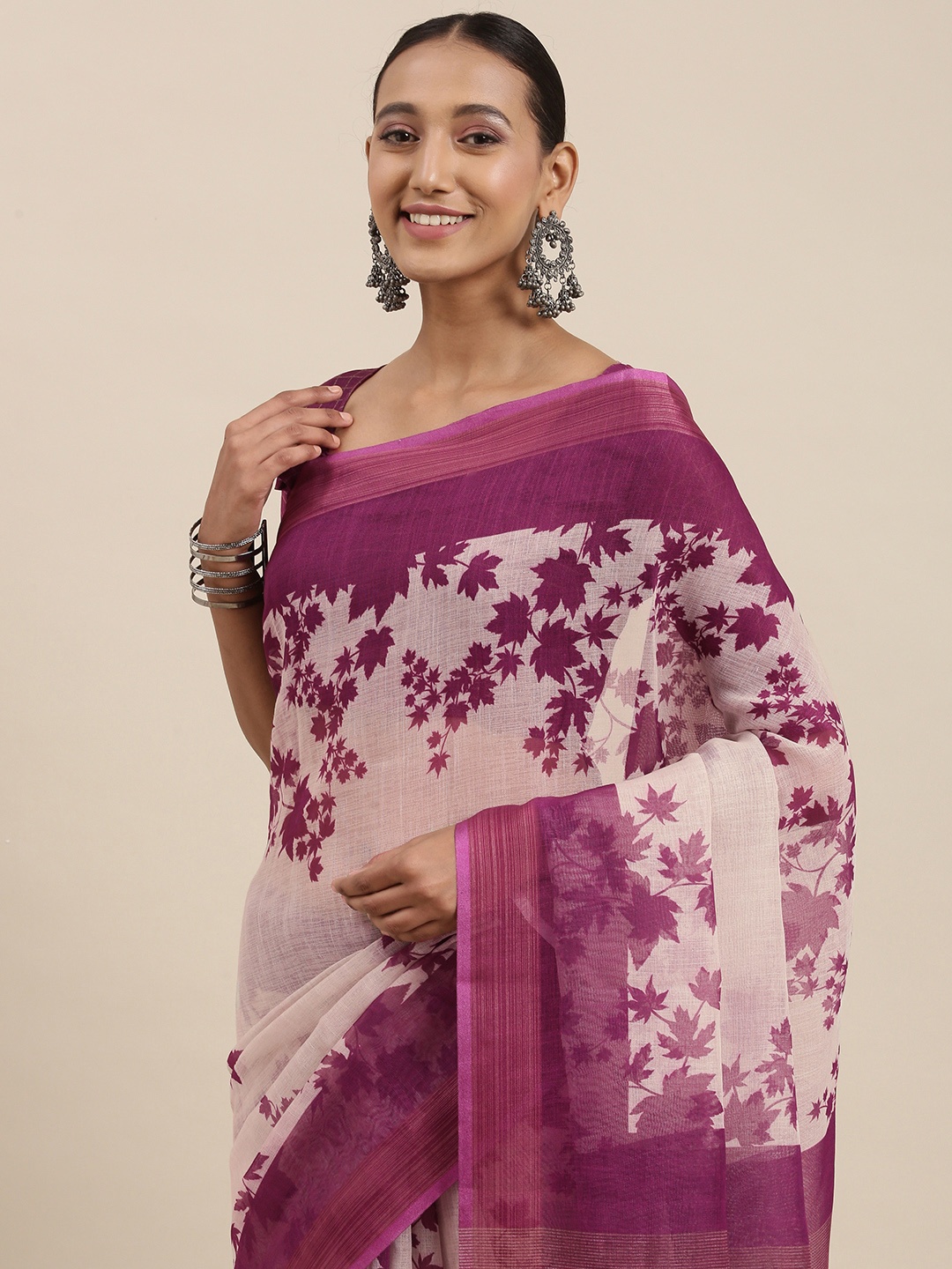 

Rudra Fashion Off White & Purple Floral Linen Blend Ikat Saree