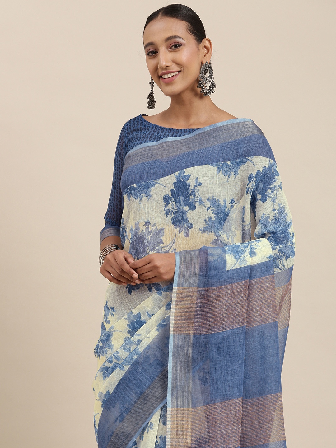 

Rudra Fashion Off White & Blue Floral Printed Ikat Saree