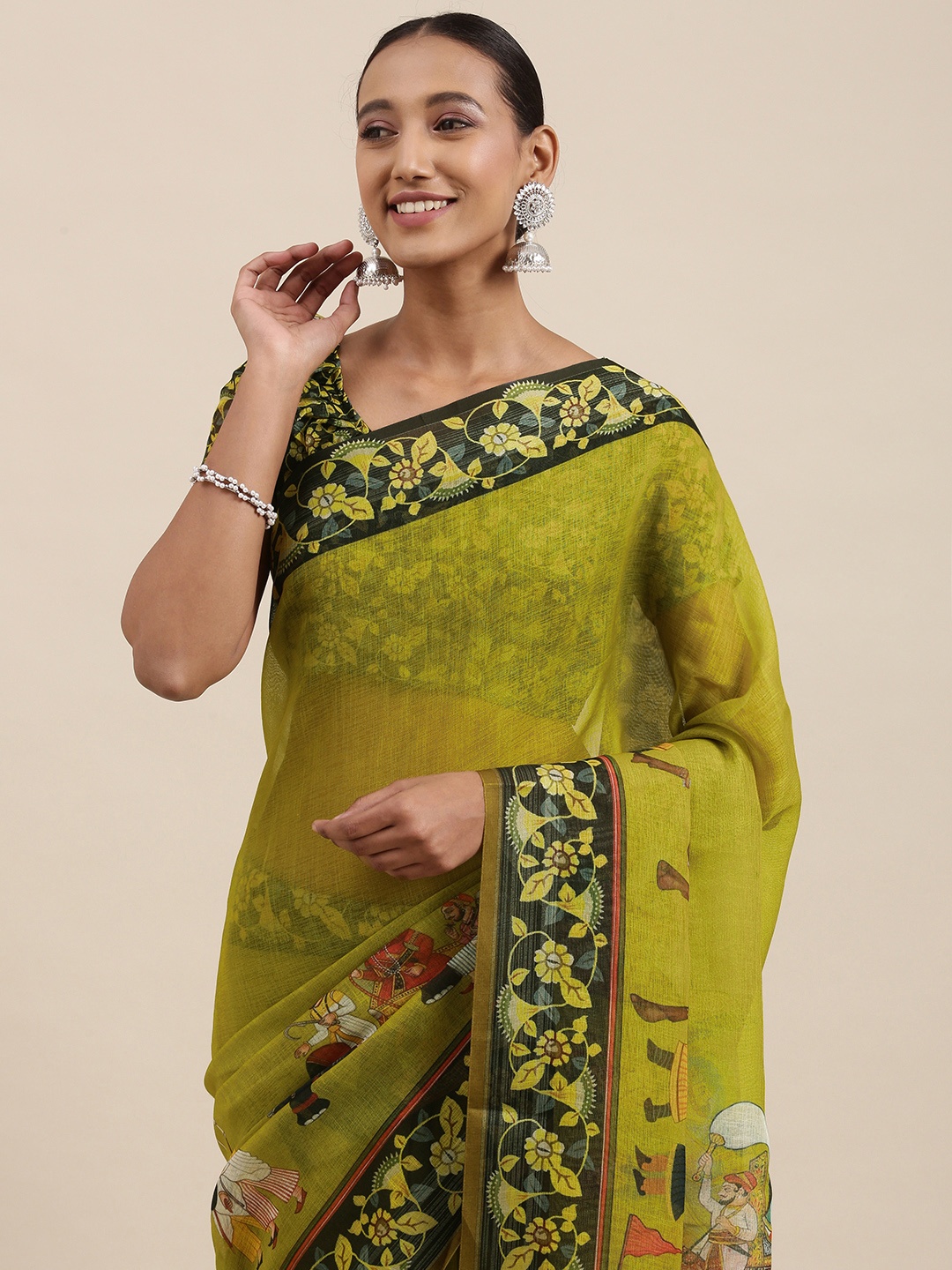 

Rudra Fashion Olive Green & Black Floral Printed Ikat Saree