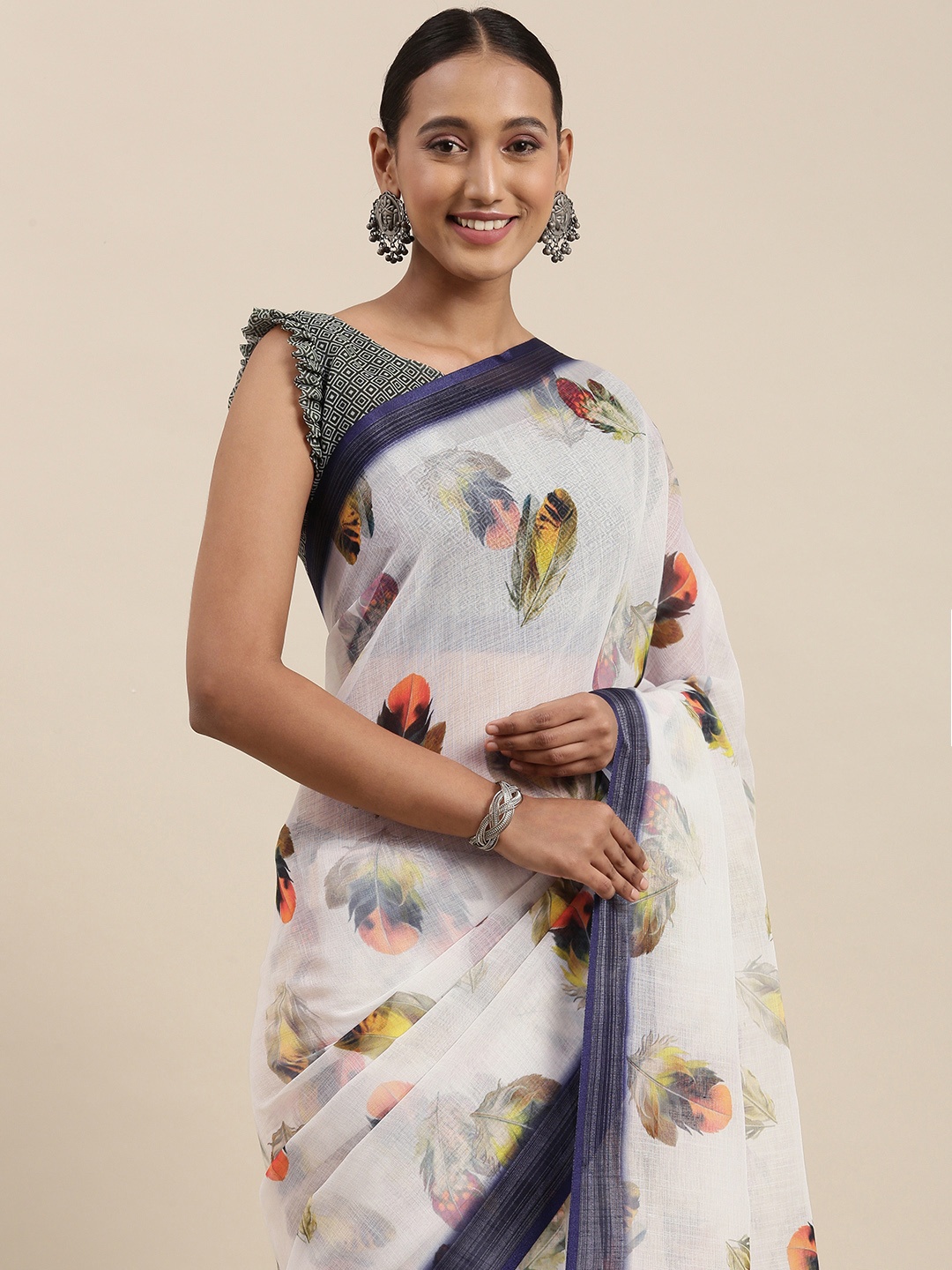 

Rudra Fashion Off White & Blue Feather Printed Ikat Saree