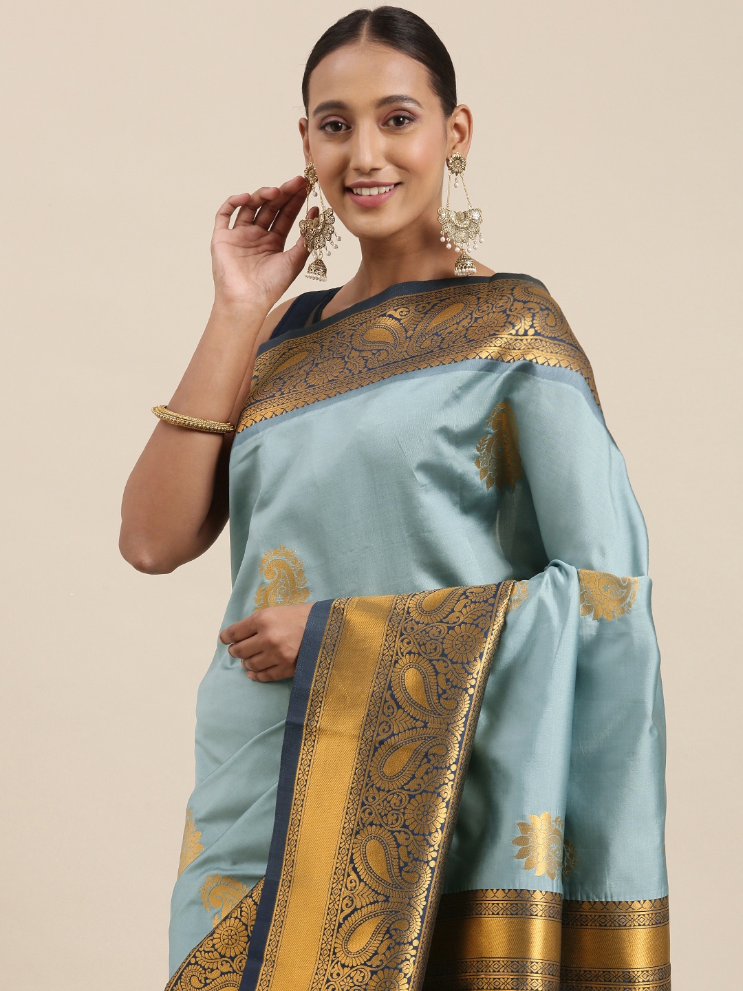 

Rudra Fashion Blue & Gold Paisley Woven Design Silk Blend Kanjeevaram Saree