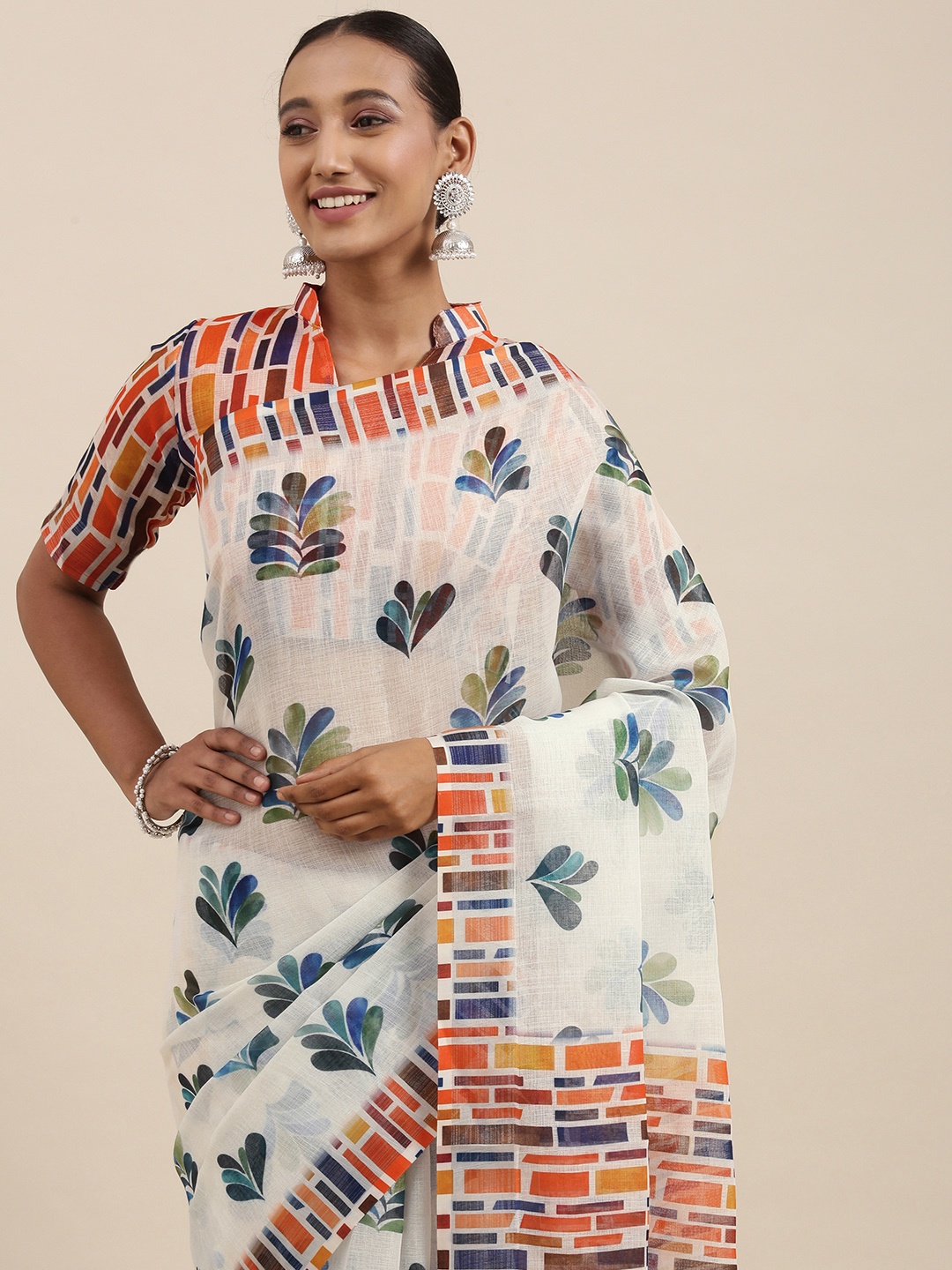 

Rudra Fashion Off White & Green Floral Printed Ikat Saree