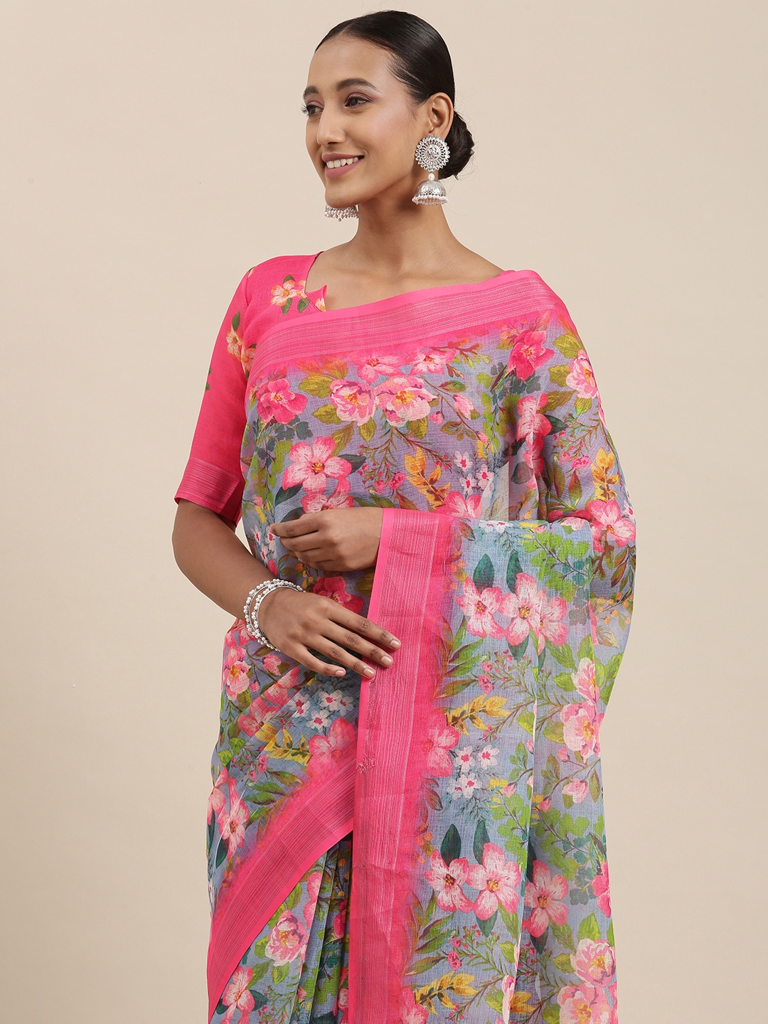 

Rudra Fashion Green & Pink Floral Printed Ikat Saree
