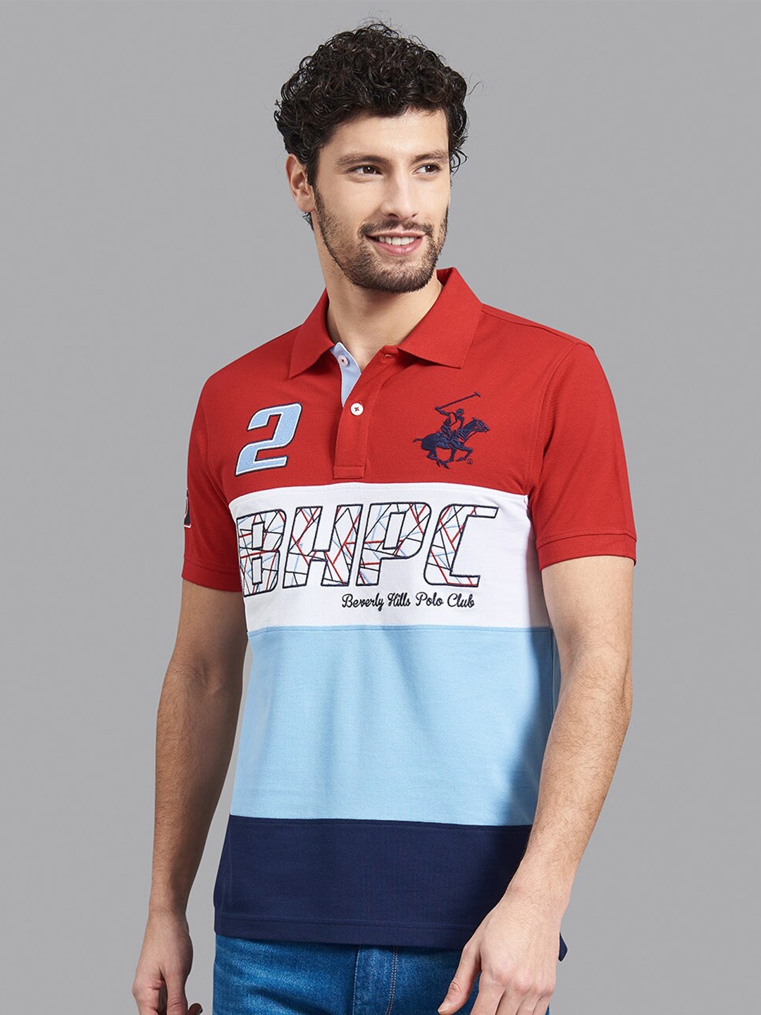 

Beverly Hills Polo Club Men Red & Turquoise Blue Colourblocked Polo Collar T-shirt