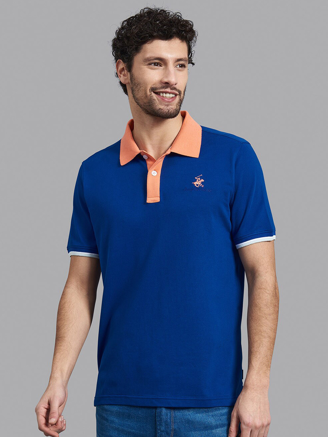 

Beverly Hills Polo Club Men Blue & Orange Polo Collar Slim Fit T-shirt