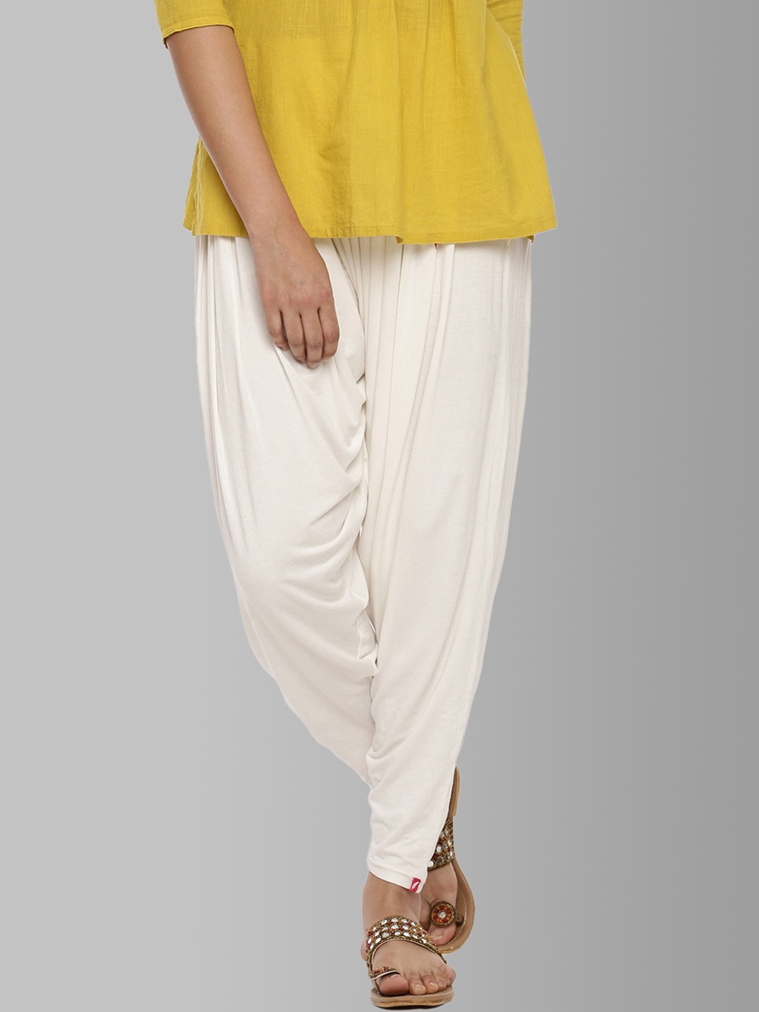 

Feather Soft Elite Women Cream Solid Loose Fit Patiala